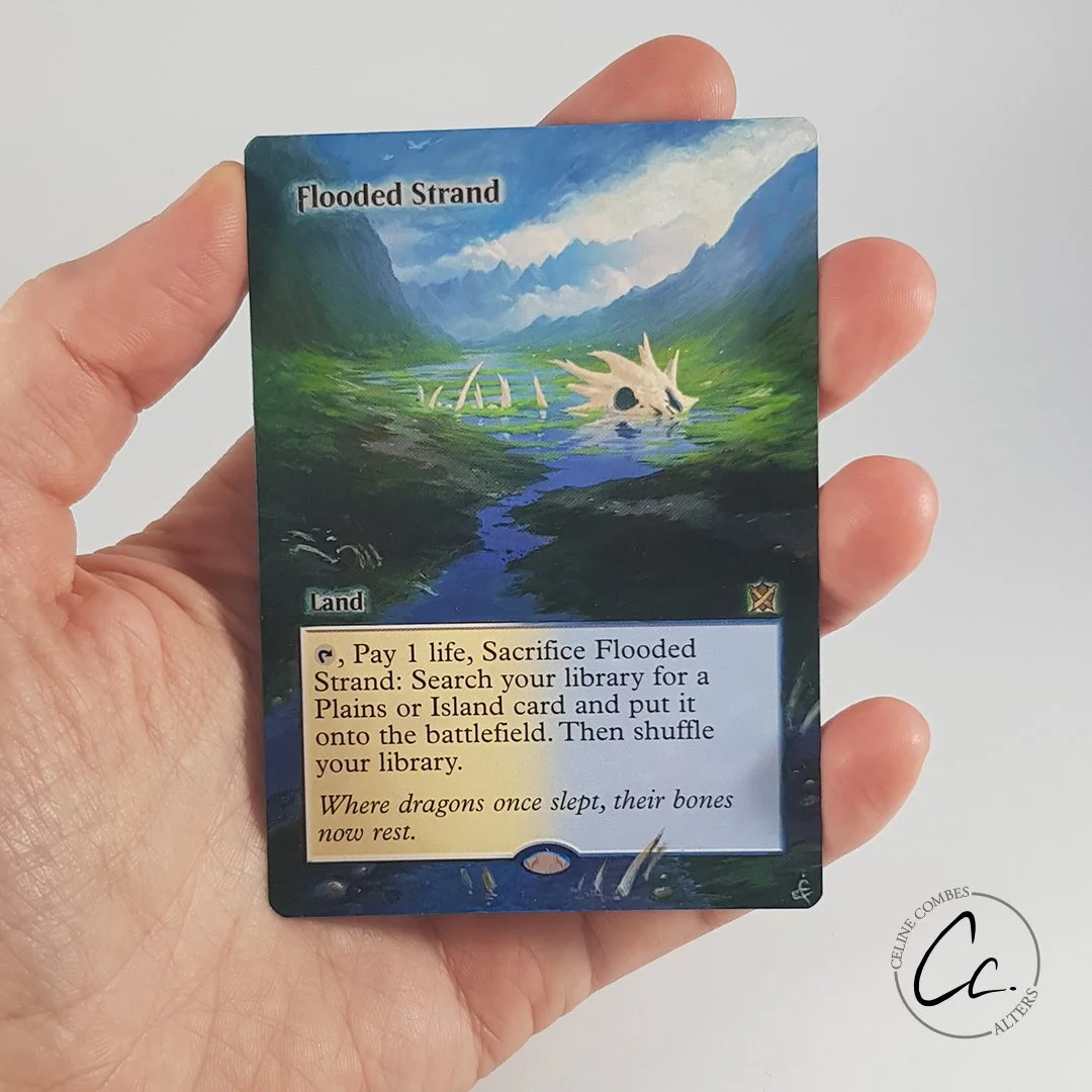 mtg-alt-art-flooded-strand-en.jpg
