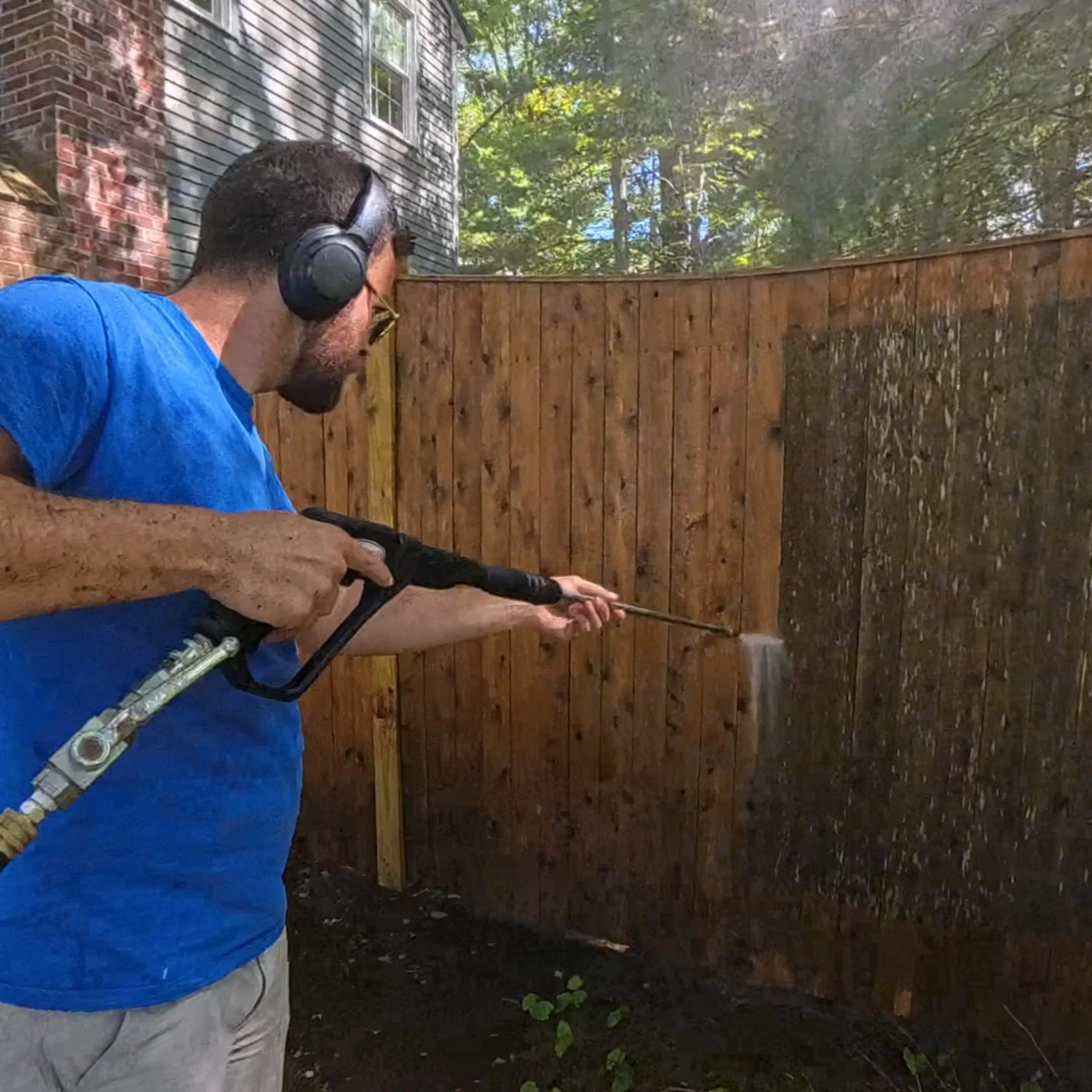 Power wash wooden fence