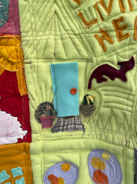 Detail from "We Do Our Living Here" 
quilted love letter to my spouse and to our home
Improvisational quilting with mixed & recycled fabrics
Ypsilanti, MI
2023