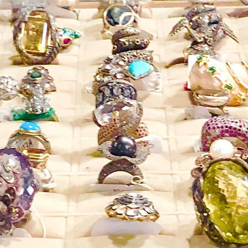 Collection of jewelry rings with various gemstones
