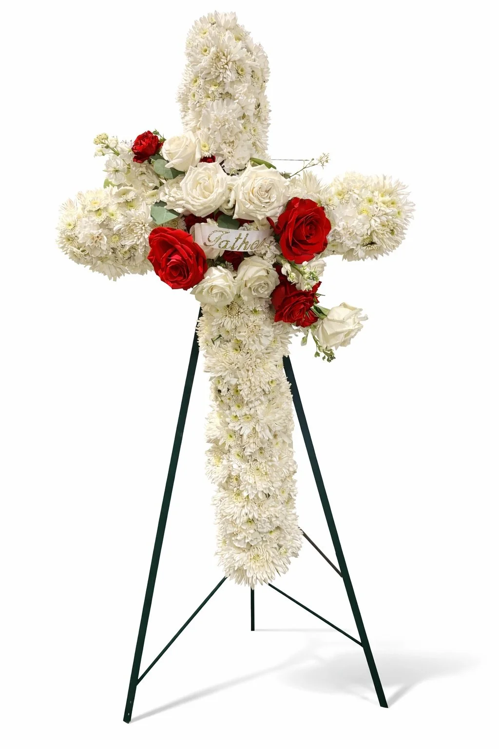 A floral cross arrangement with white, red, and cream flowers, mounted on a black metal easel, with a "Gather" ribbon in the center.