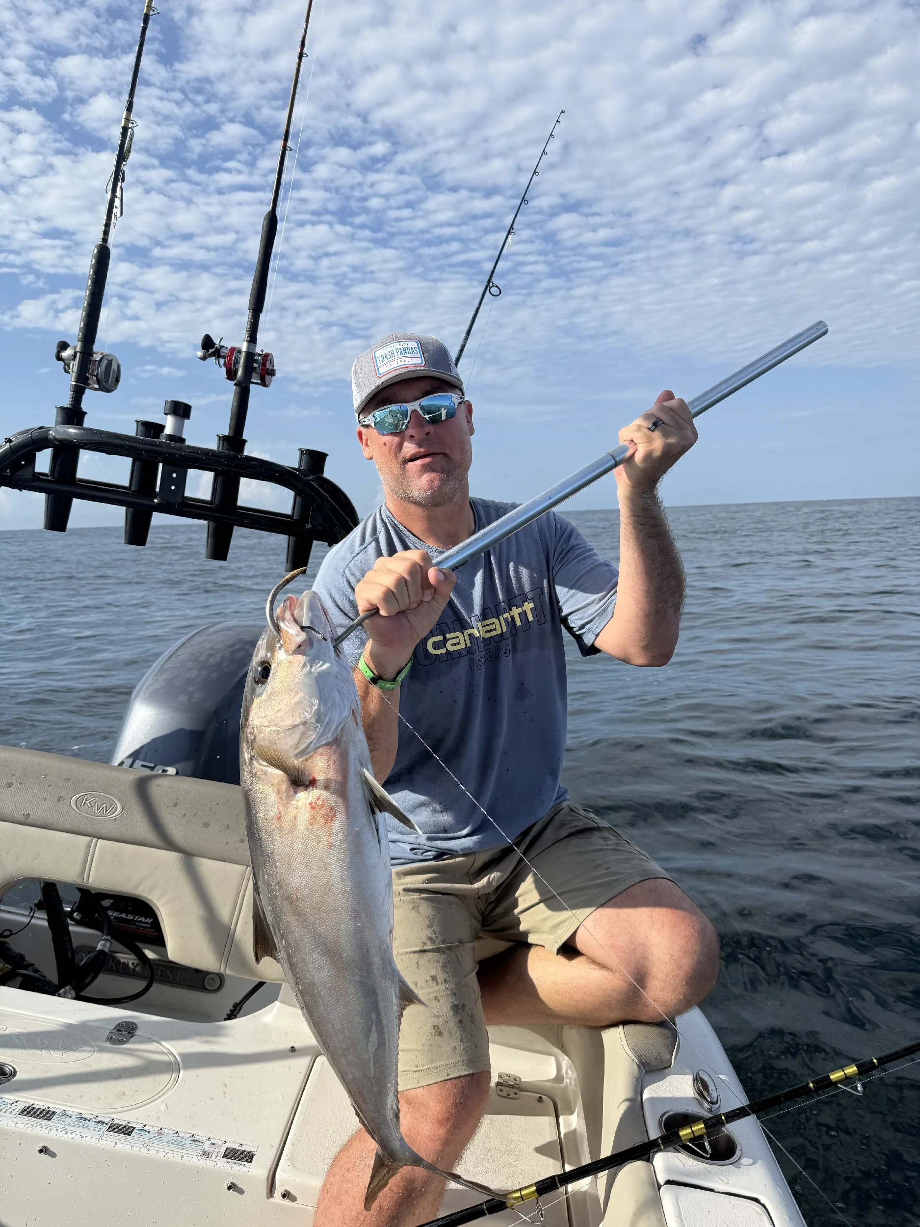 Man with his Gulf catch on a gaff