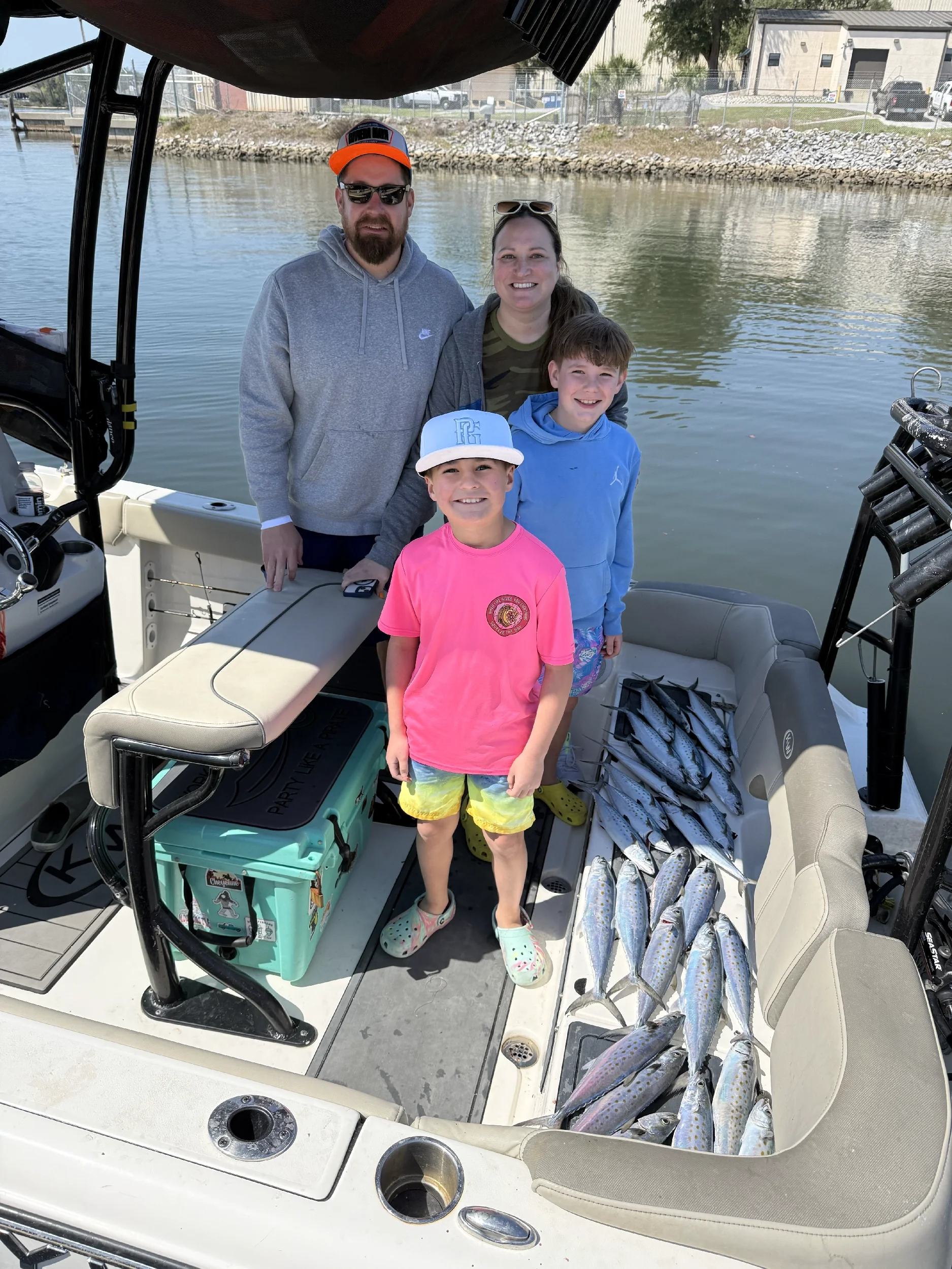 Family on charter boat after a day in the Gulf