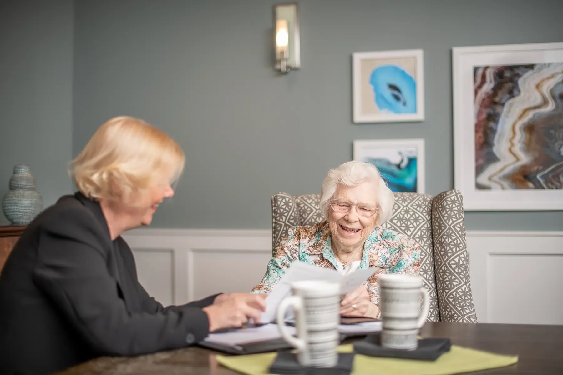 Infographic illustrating monthly assisted living fees and what is included in Oregon senior communities