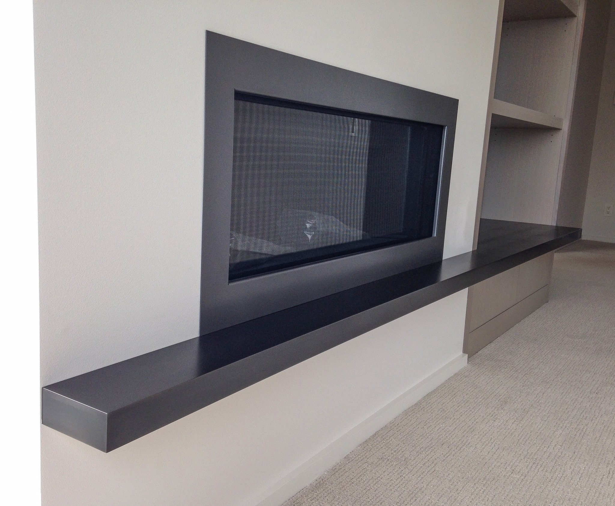 Black metal fireplace.