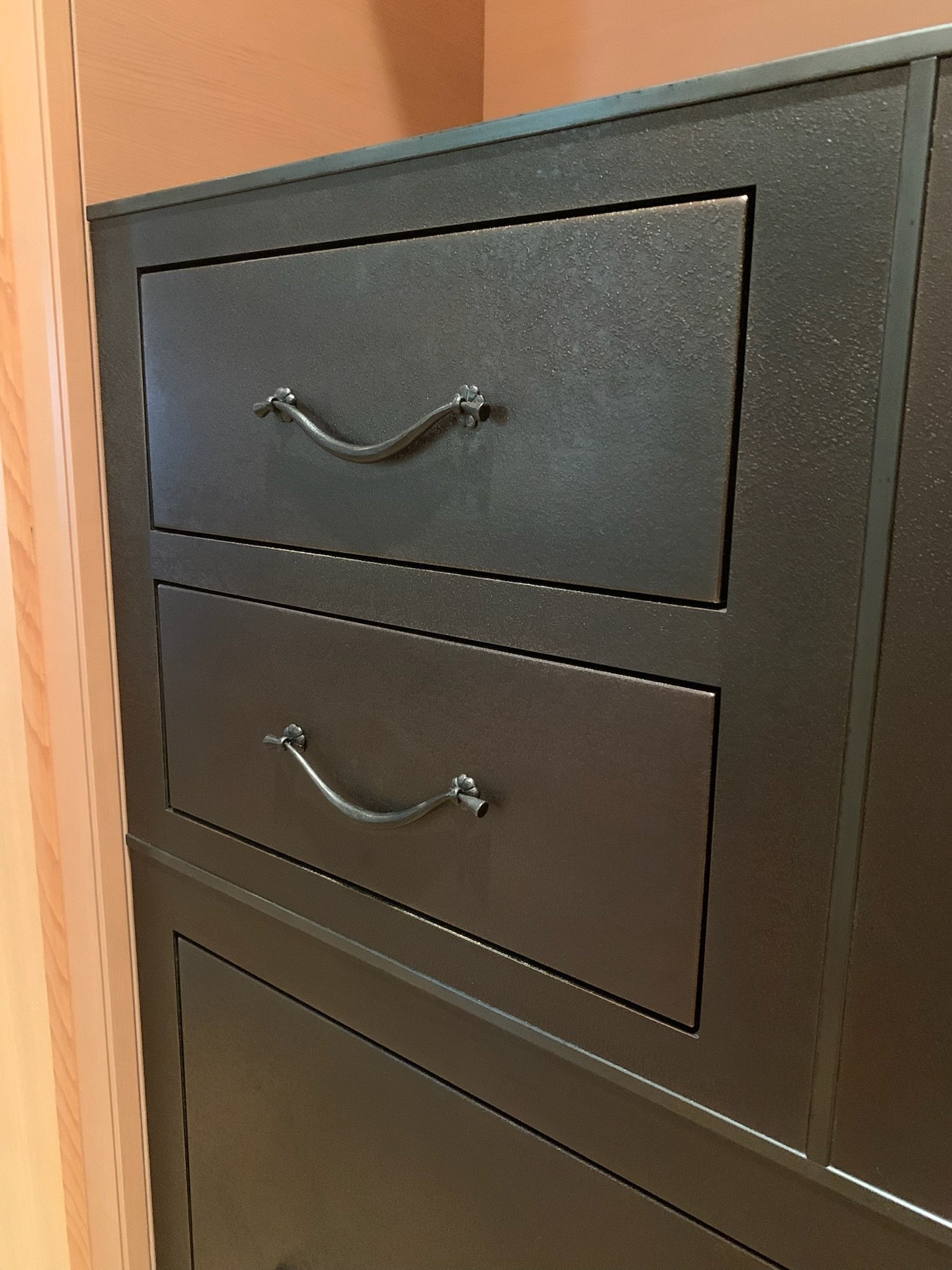 Custom furniture with handle detail.