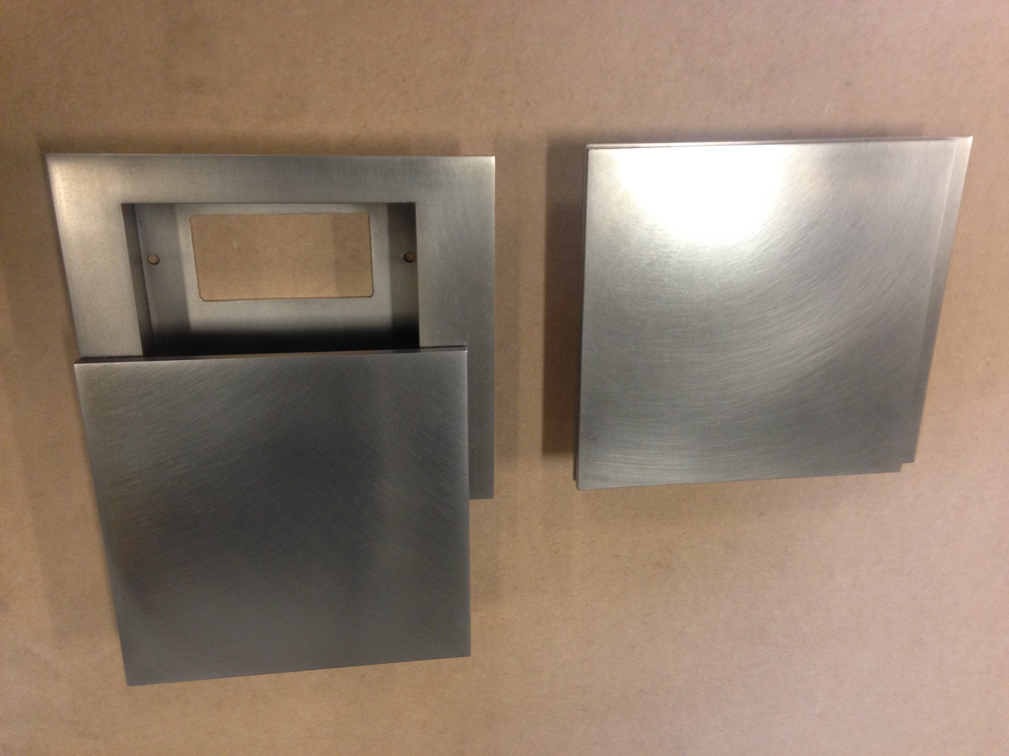 Disassembled custom electrical outlet cover.
