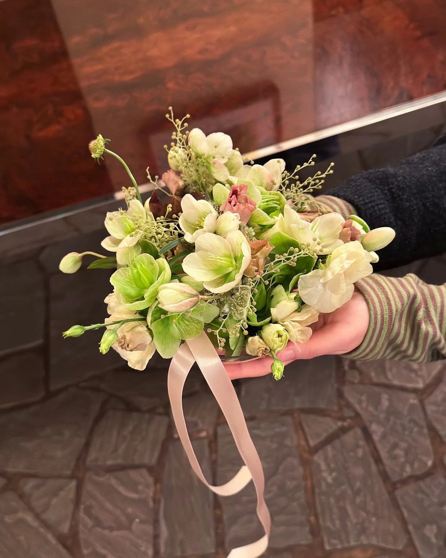 Bridal bouquet and buttonholes created for C&amp;N 🤎

Soft whites and greens with a touch of deep brown orchids,
bringing texture and contrast to this elegant look.

@rohaflower_shop 

#Roha_wedding