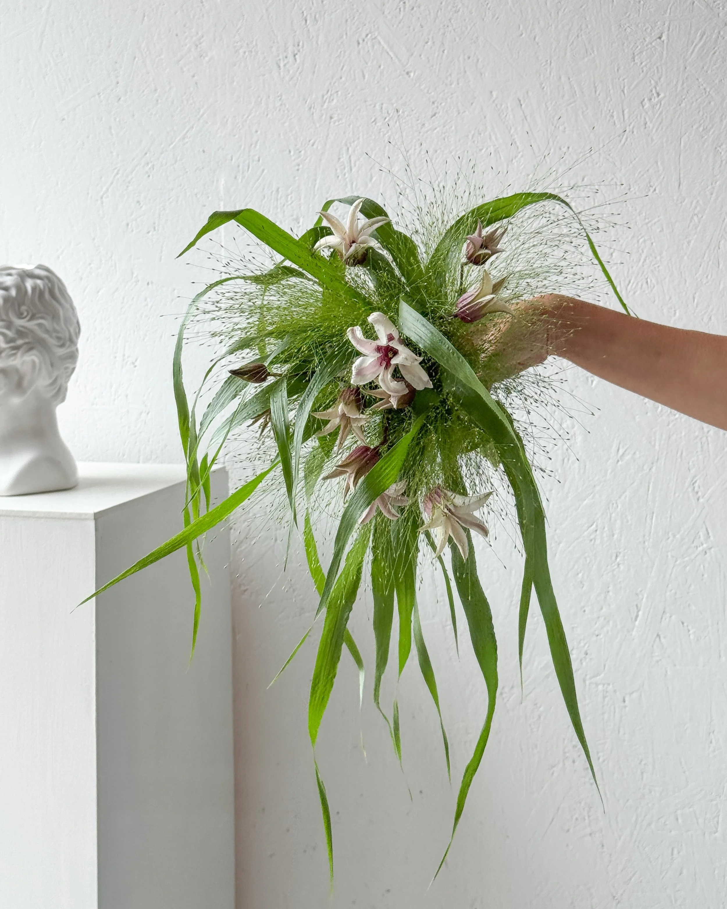 A bouquet created for the photos, alongside the main bridal bouquet 🤍

Designed to feel effortless and natural, with soft movement, delicate textures, and just enough detail to complement the dress without overwhelming it.