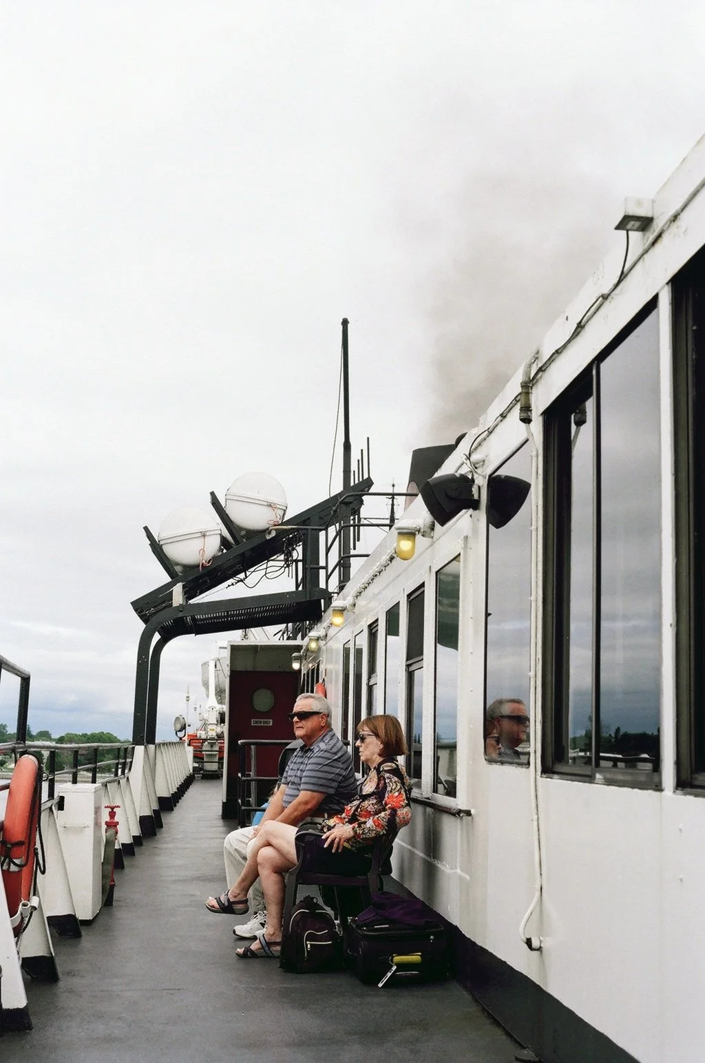 Passengers aboard the S.S. Badger, a car and passenger steamship that ferries between Manitowoc, Wisconsin, and Ludington, Michigan.  