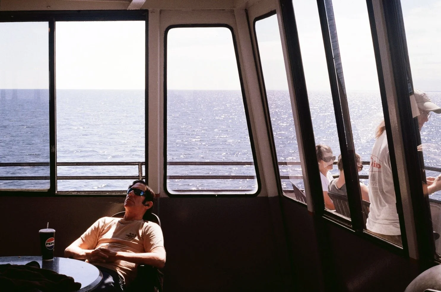 Passengers aboard the S.S. Badger, a car and passenger steamship that ferries between Manitowoc, Wisconsin, and Ludington, Michigan.  