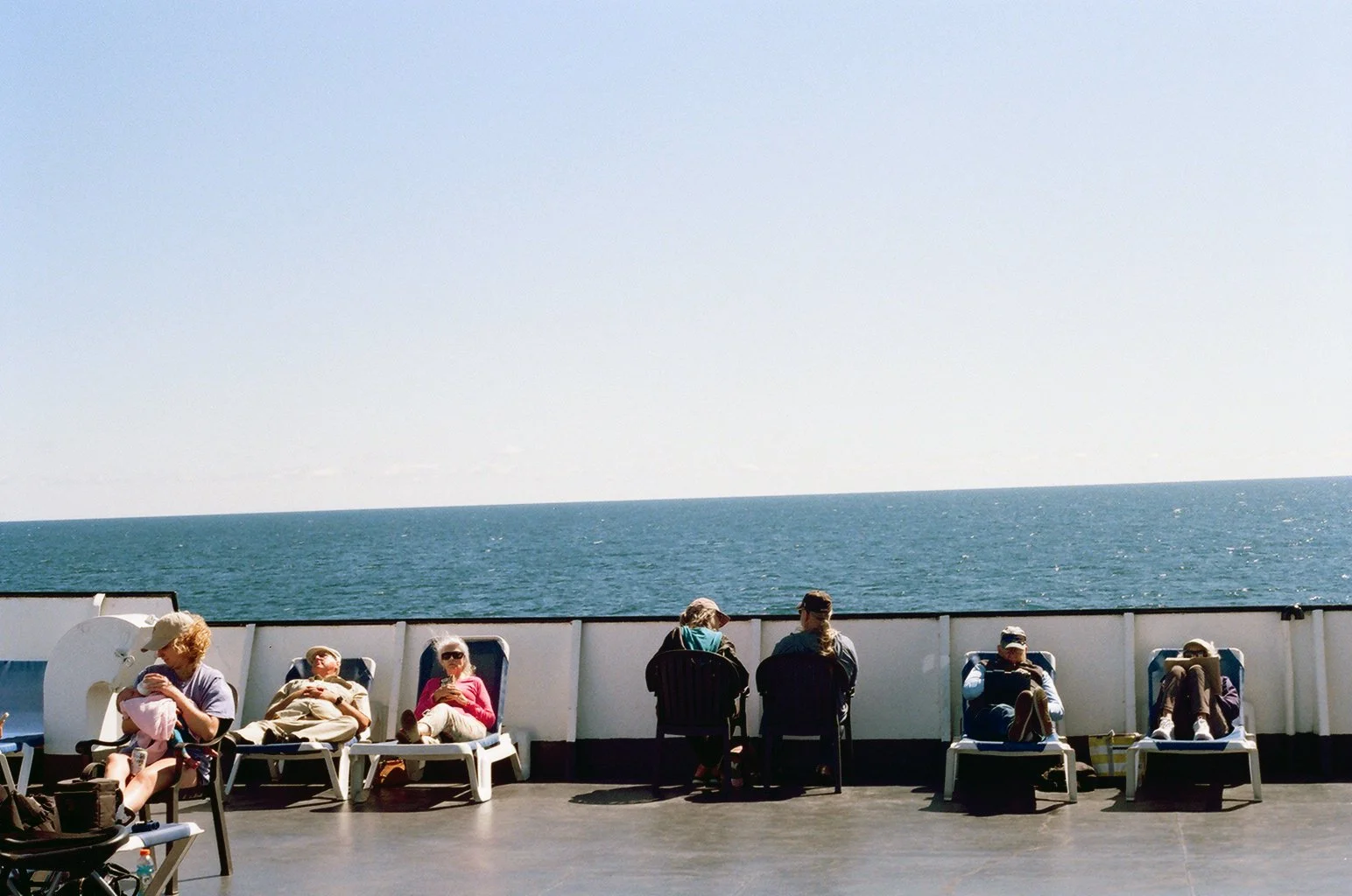 Passengers aboard the S.S. Badger, a car and passenger steamship that ferries between Manitowoc, Wisconsin, and Ludington, Michigan.  