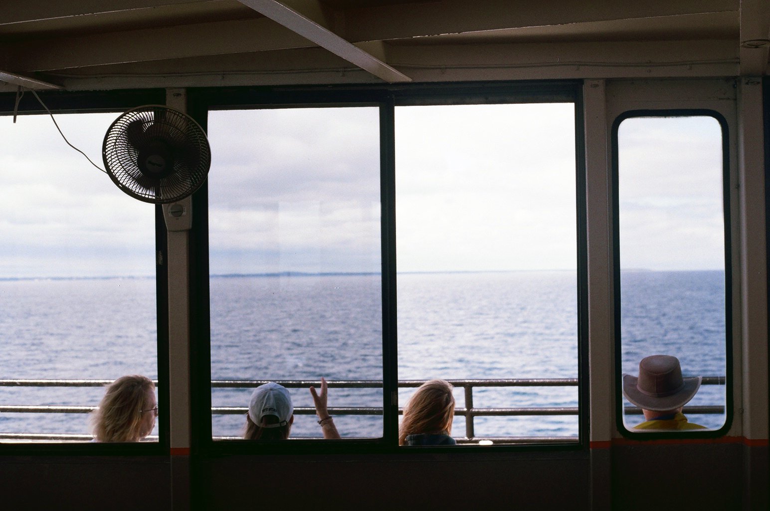 Passengers aboard the S.S. Badger, a car and passenger steamship that ferries between Manitowoc, Wisconsin, and Ludington, Michigan.  