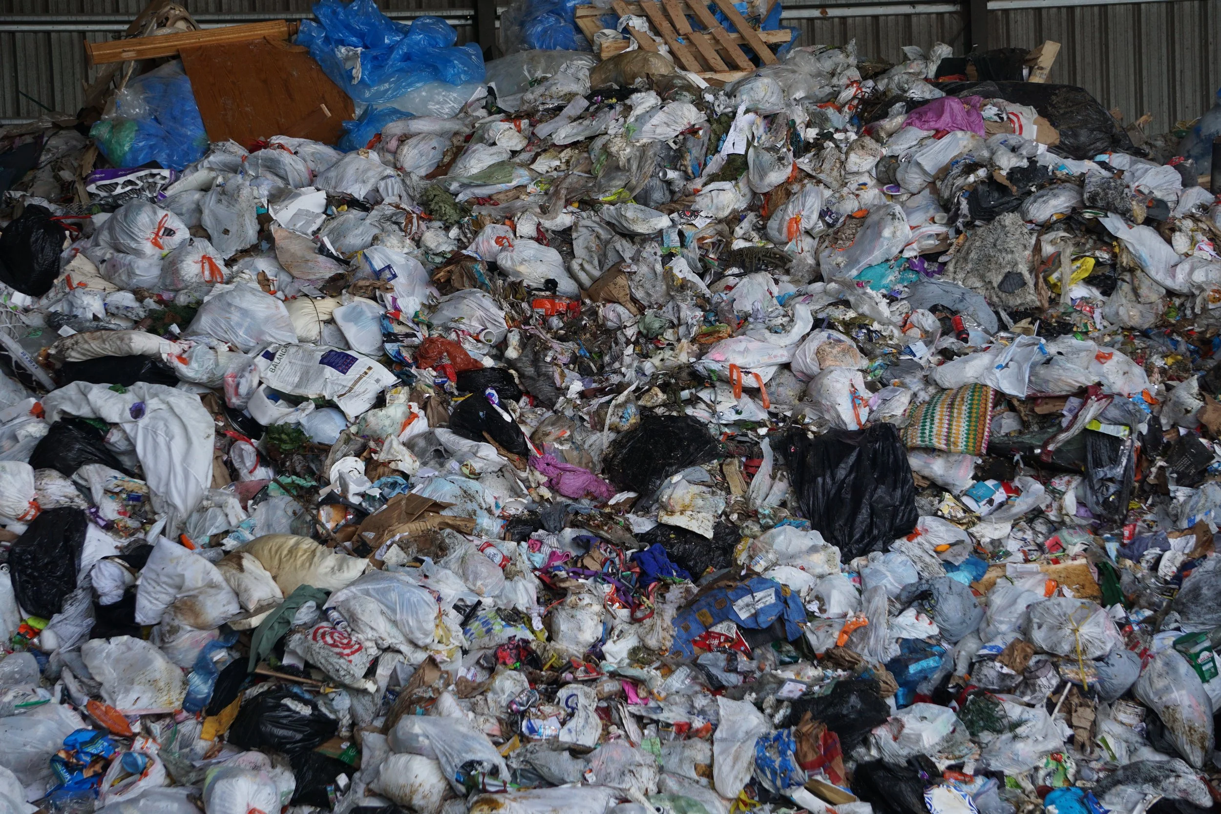  A close-up of flood and trash debris at the Recycling &amp; Disposal Services in Ferndale, Wash., on Feb. 6, 2026. When the flood hit Whatcom County, the RDS site did not have an end date for free disposal, causing individuals to rush to remove debr