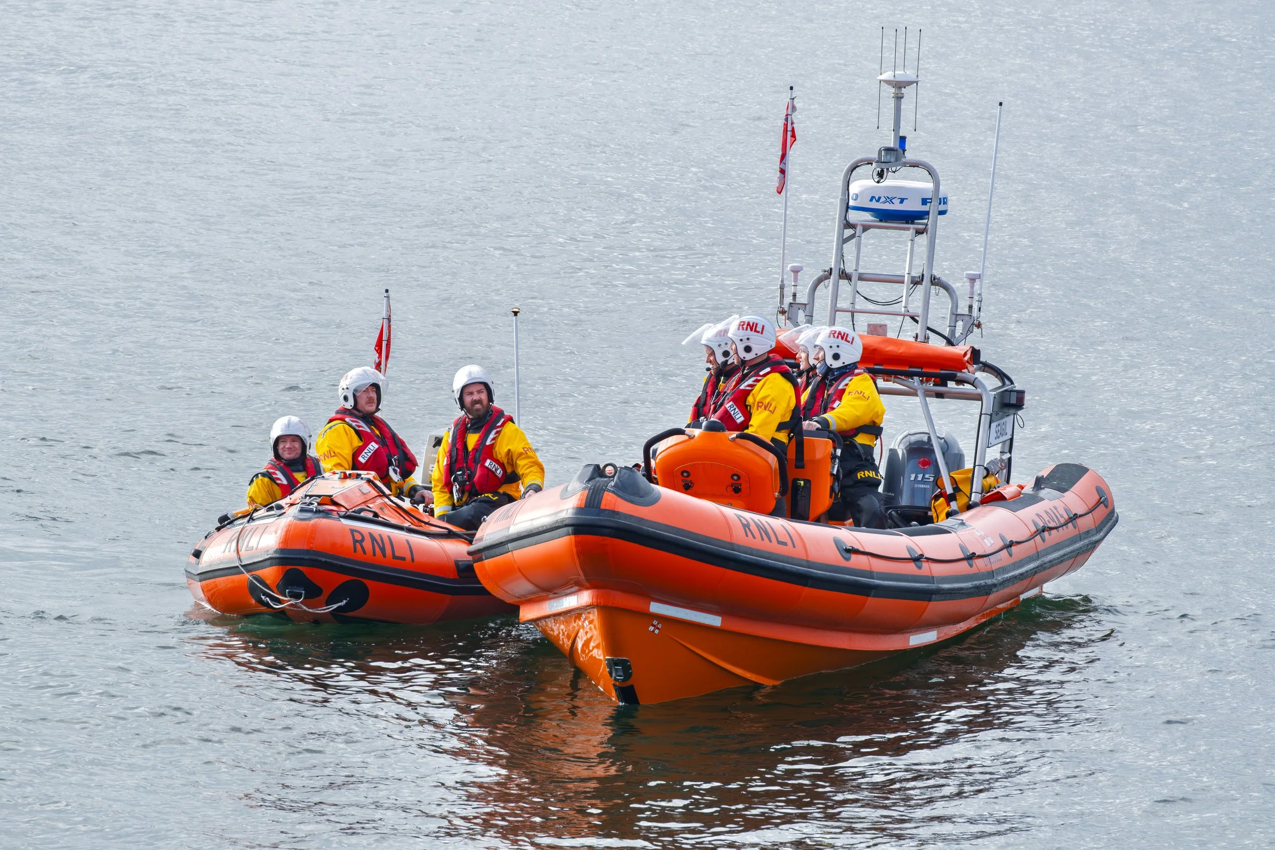 Sunderland RNLI volunteers photographed within their lifeboat station environment.