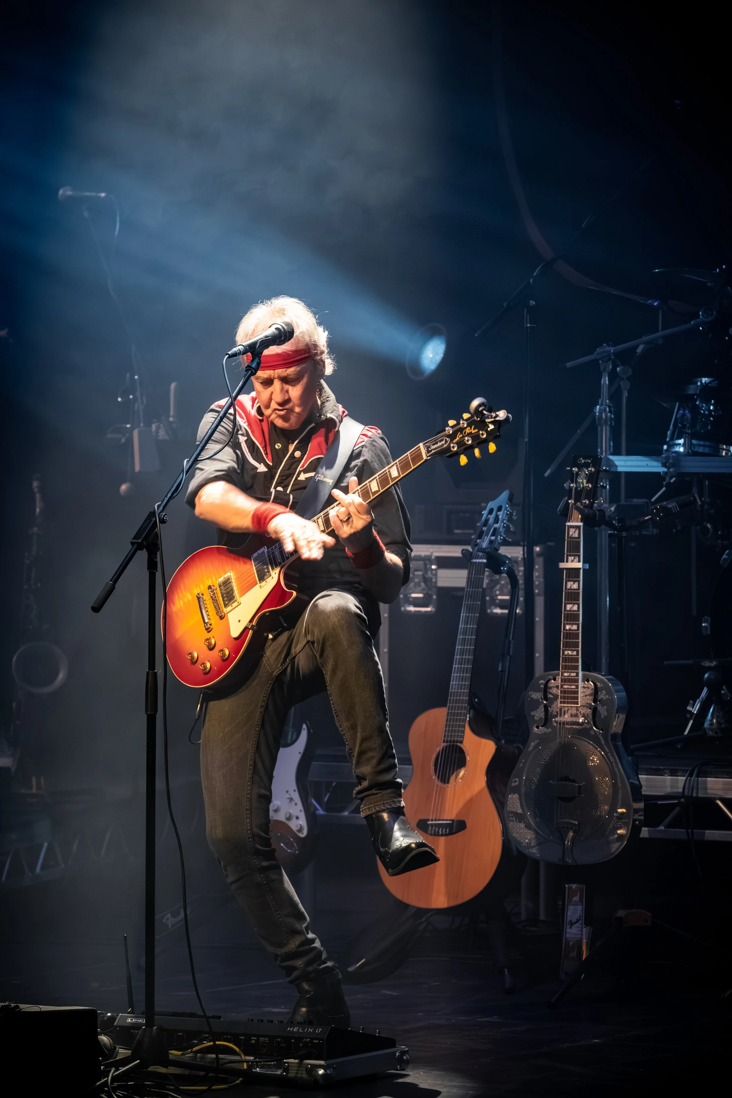 Artist performing under stage lights at The Fire Station, Sunderland.