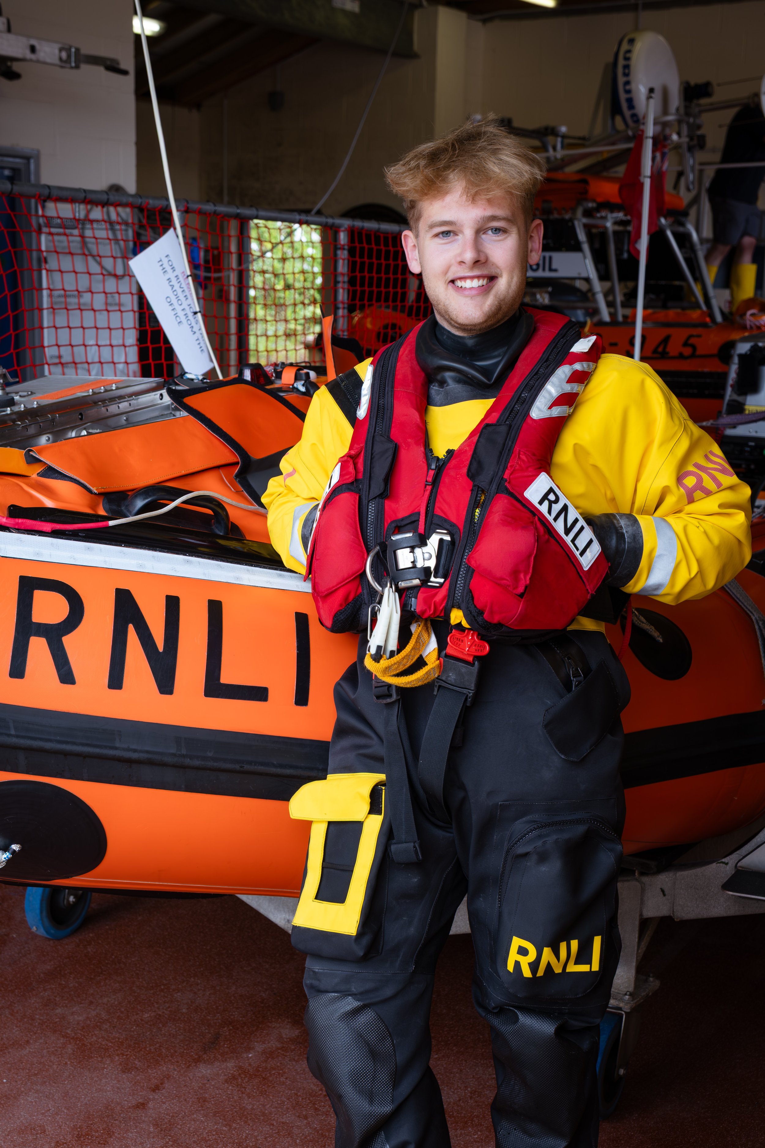 RNLI volunteer crew member in lifeboat gear at Sunderland RNLI station, photographed for a documentary photography project.