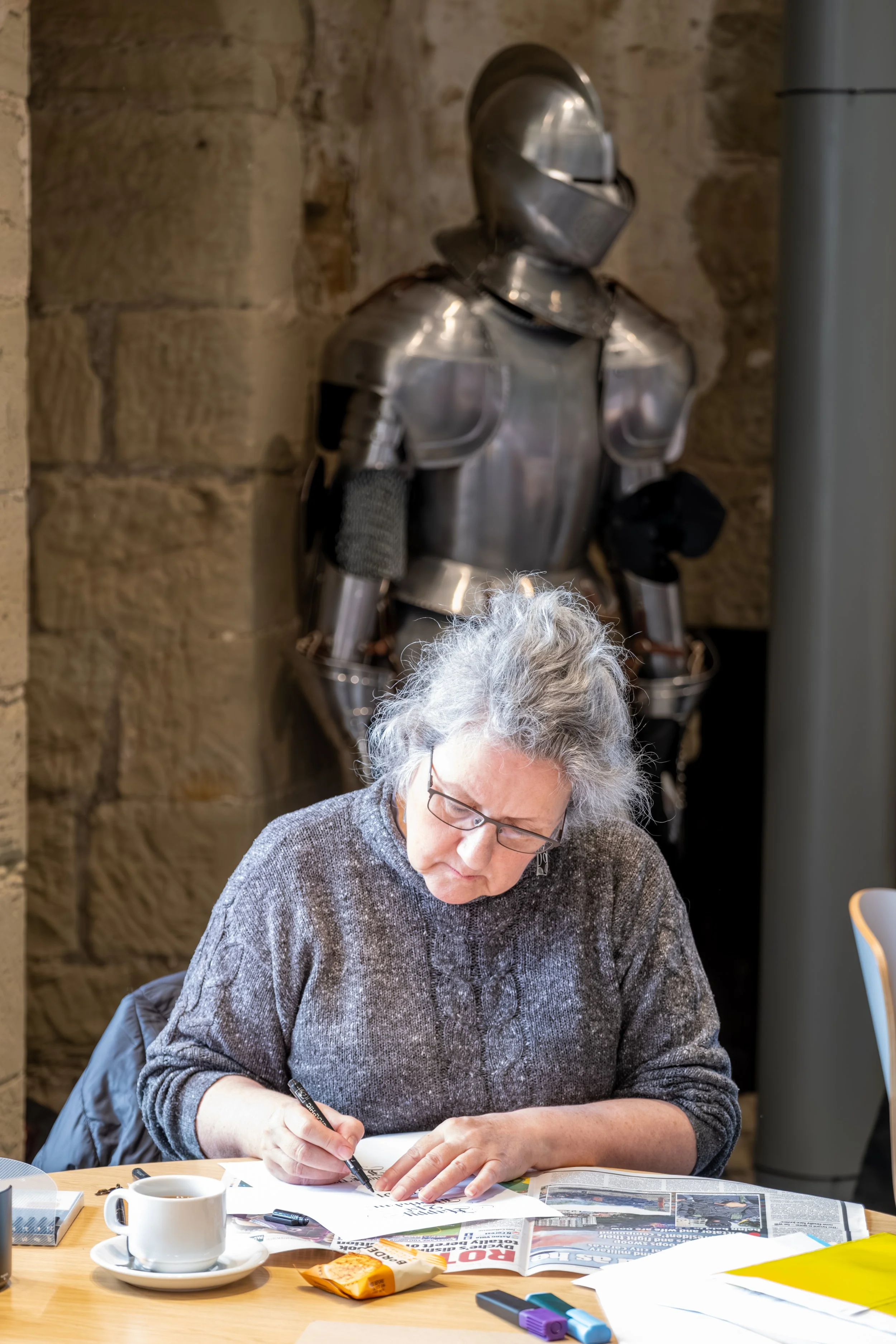 Calligraphy activity photographed during a Pink Collar Gallery workshop at Hylton Castle.