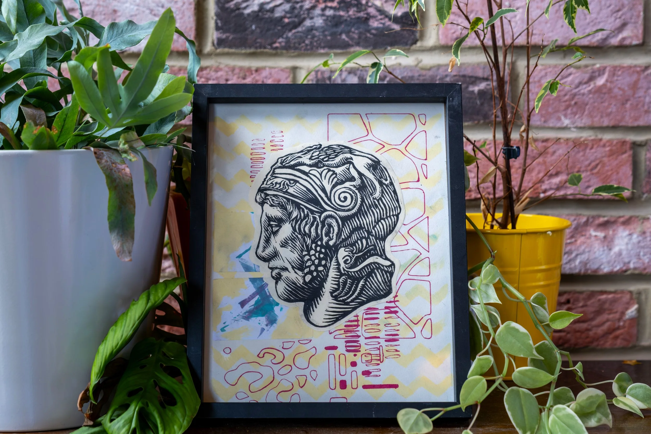 Original artwork photographed on display within an exhibition setting.