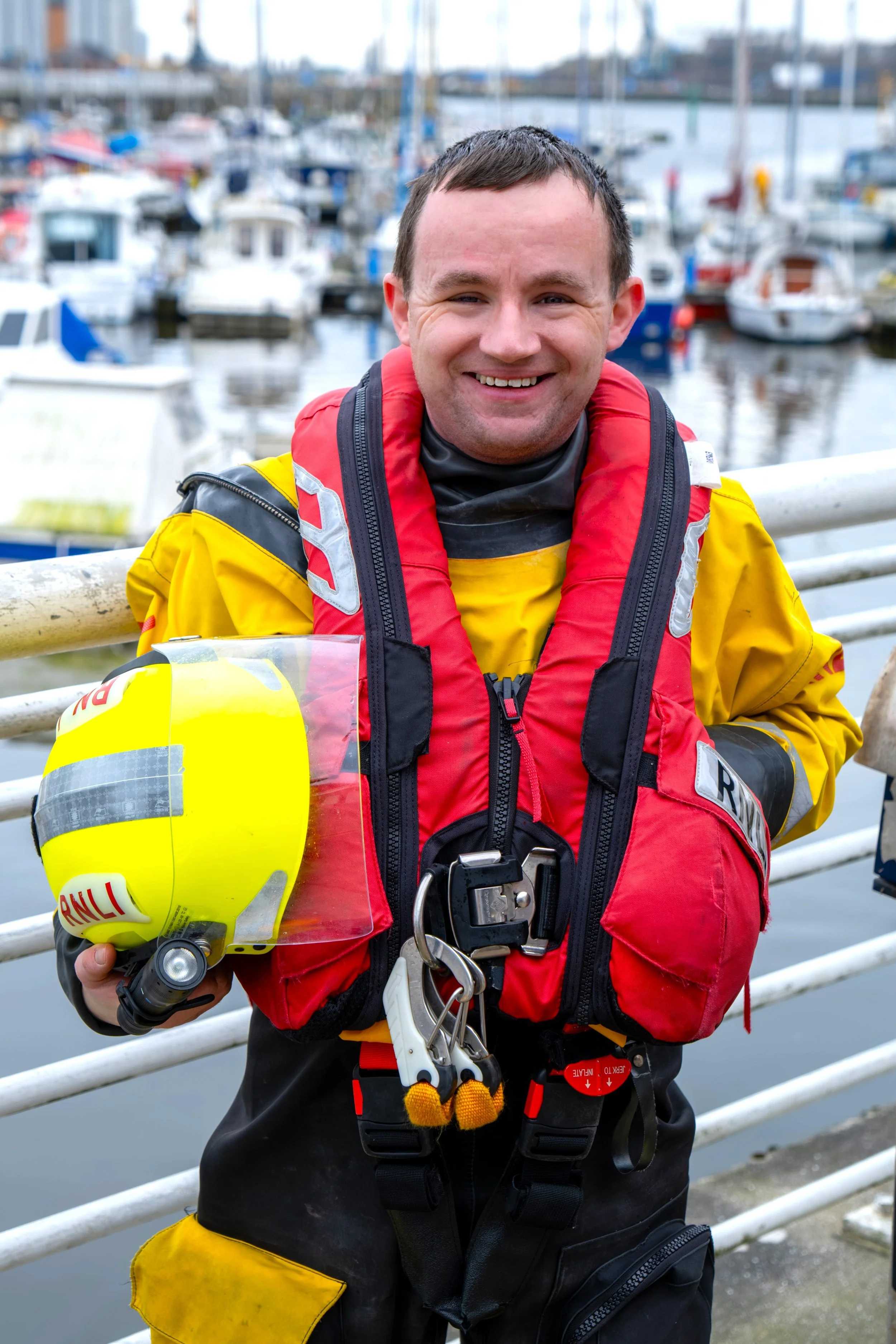 Tynemouth Marina with a local charity volunteer posing for a headshot.