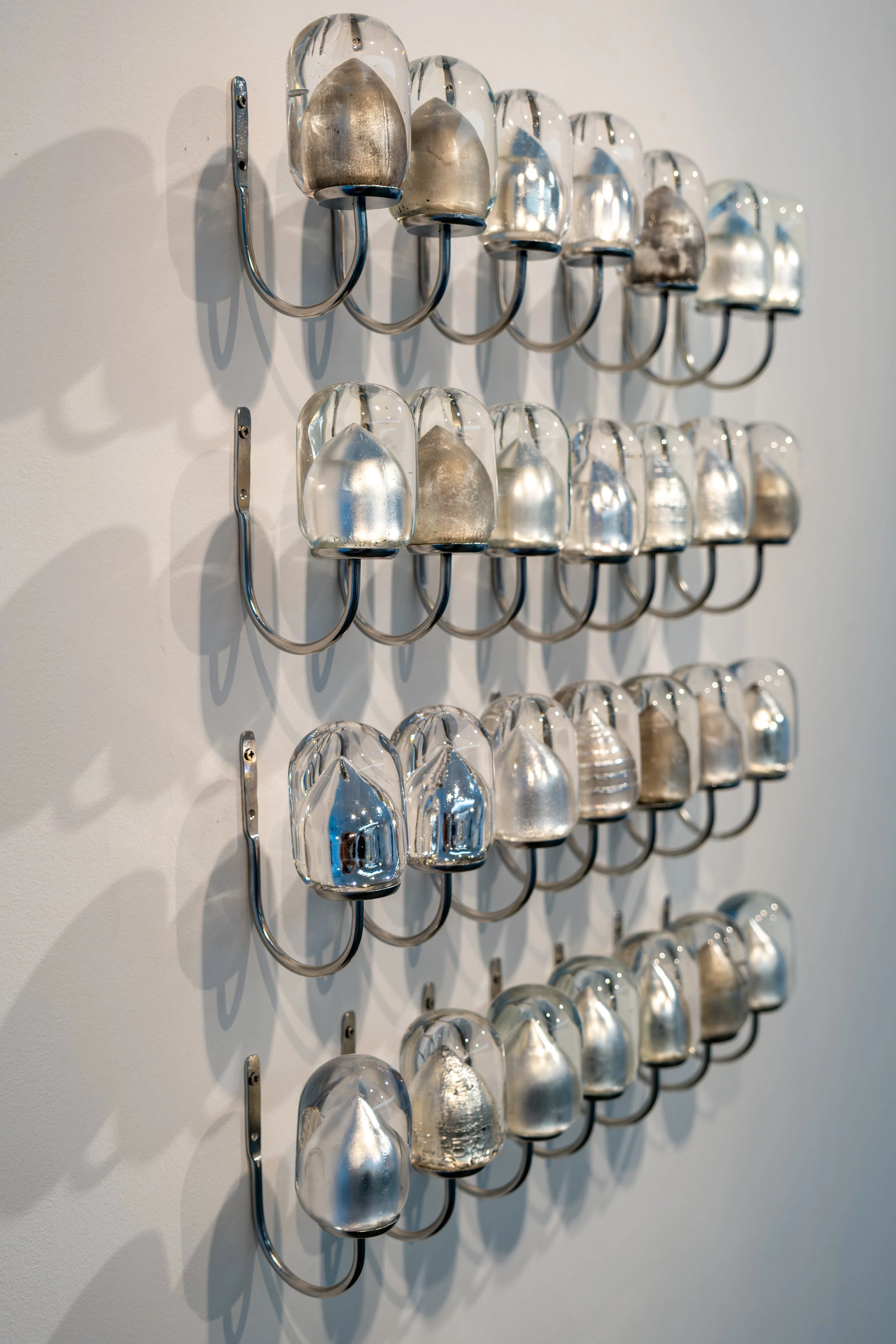 Glass artwork by a local artist photographed within the National Glass Centre exhibition space.
