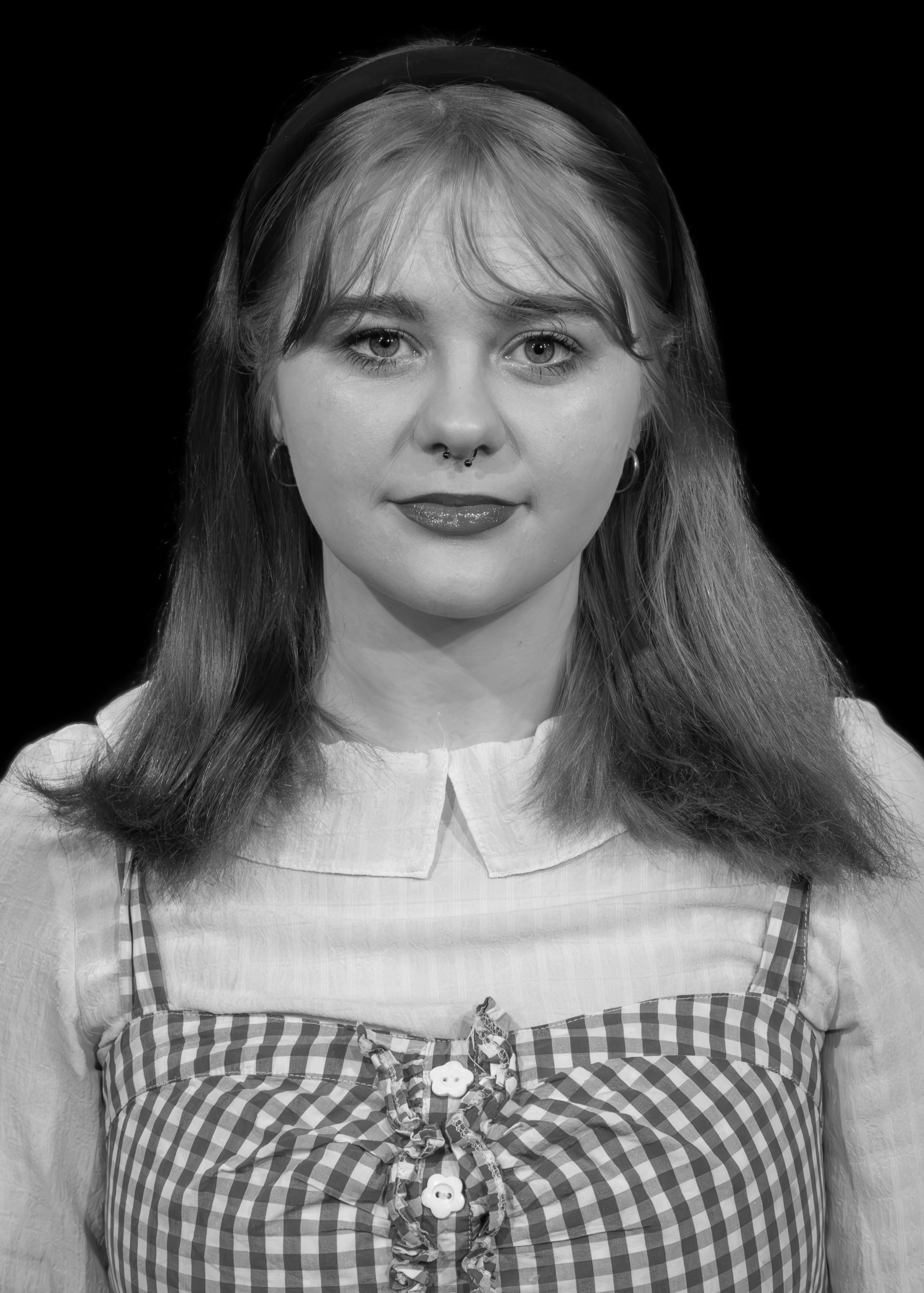 Professional headshot of a performer from a production of A Chorus Line.