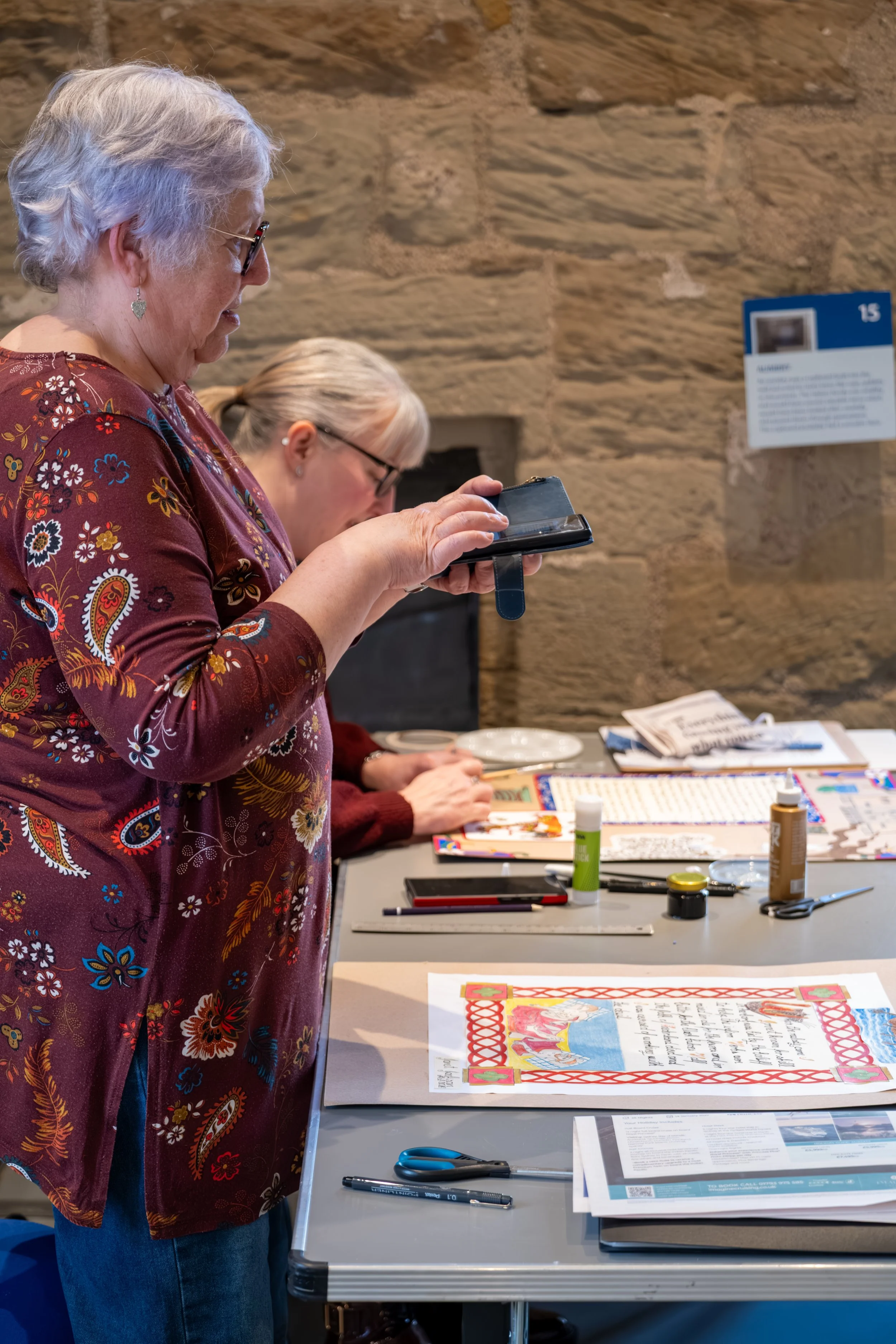 Documentary photograph of participants during a creative workshop at Hylton Castle, Sunderland.