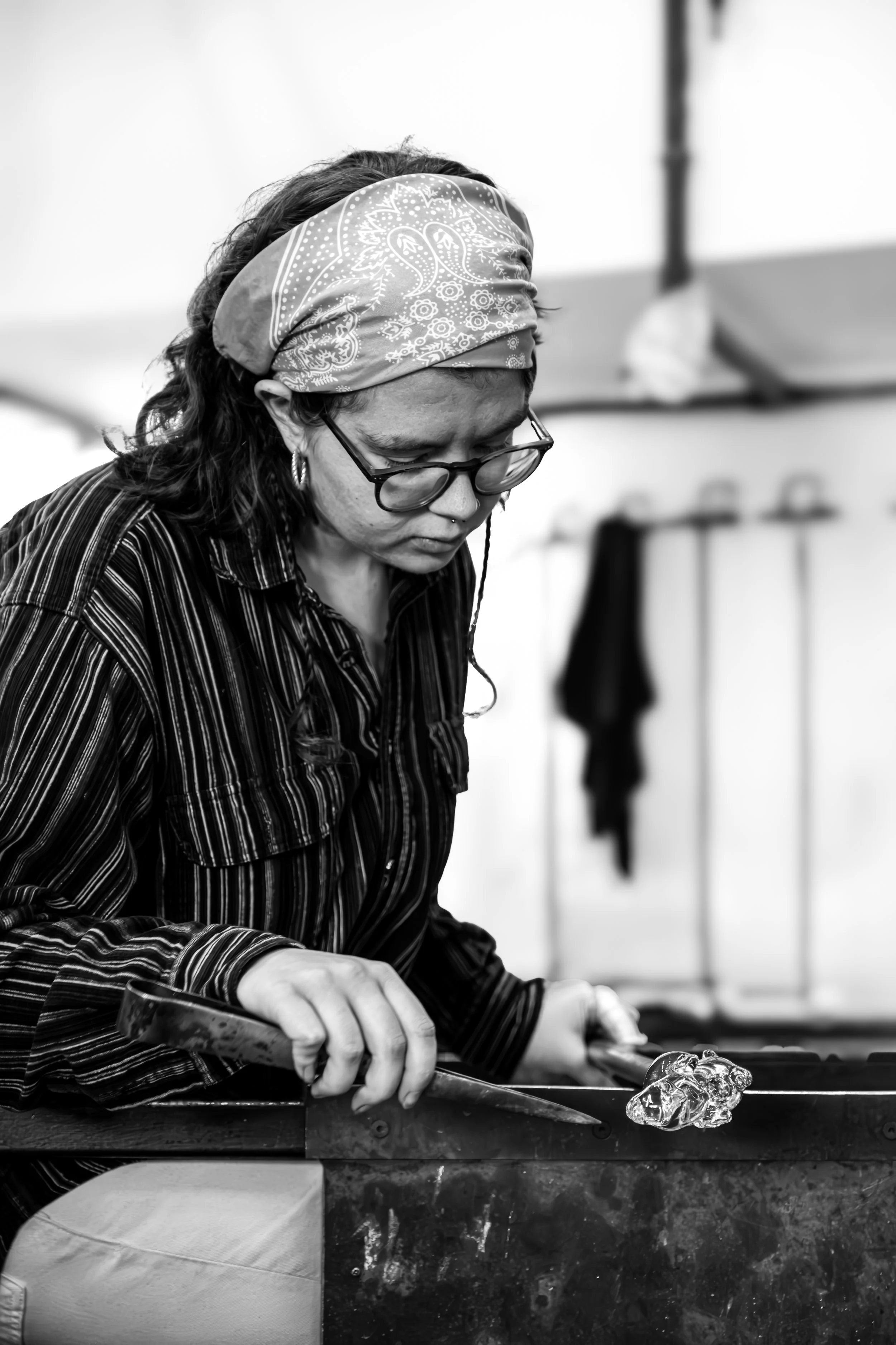Artist photographed in their Studio at the National Glass Centre in Sunderland doing some intricate glasswork.