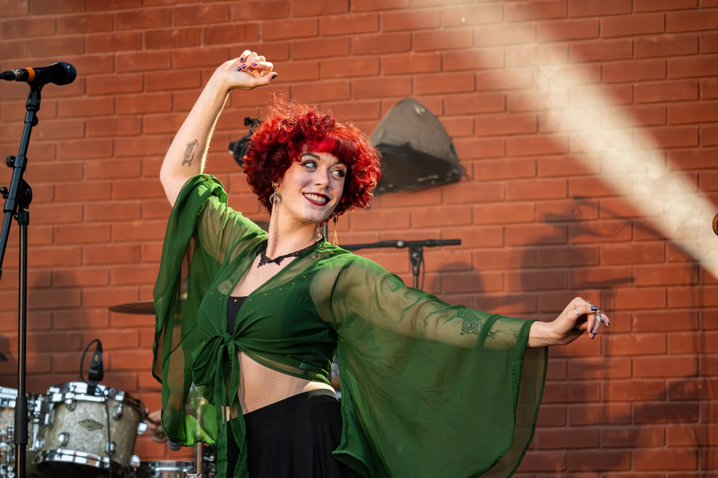 Artist performing on stage during a live music event at The Fire Station in Sunderland.