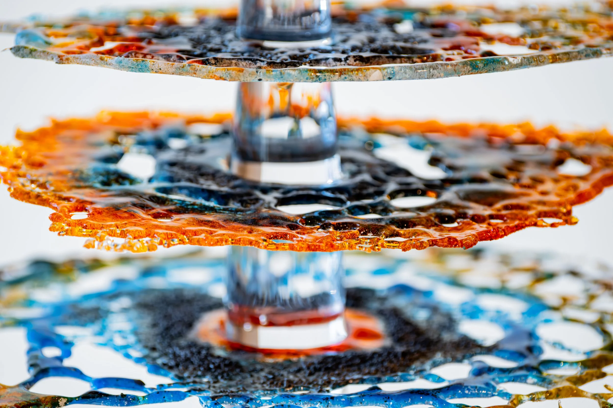 Ornate glass art pictured in an exhibition space.