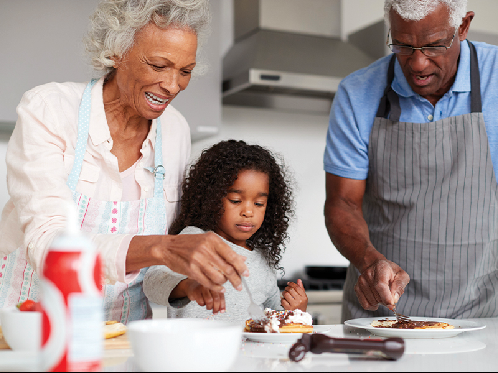 Grandparents cooking with grandkids