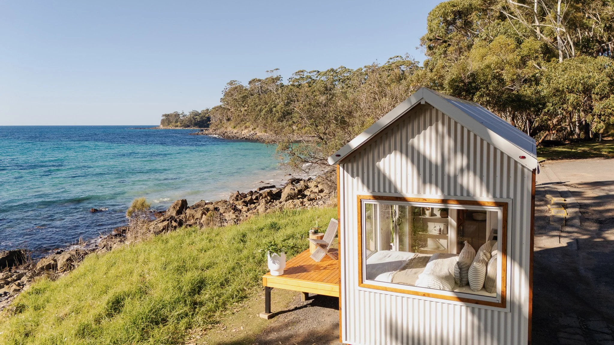 Surfmist tiny home overlooking the beach with coastal views