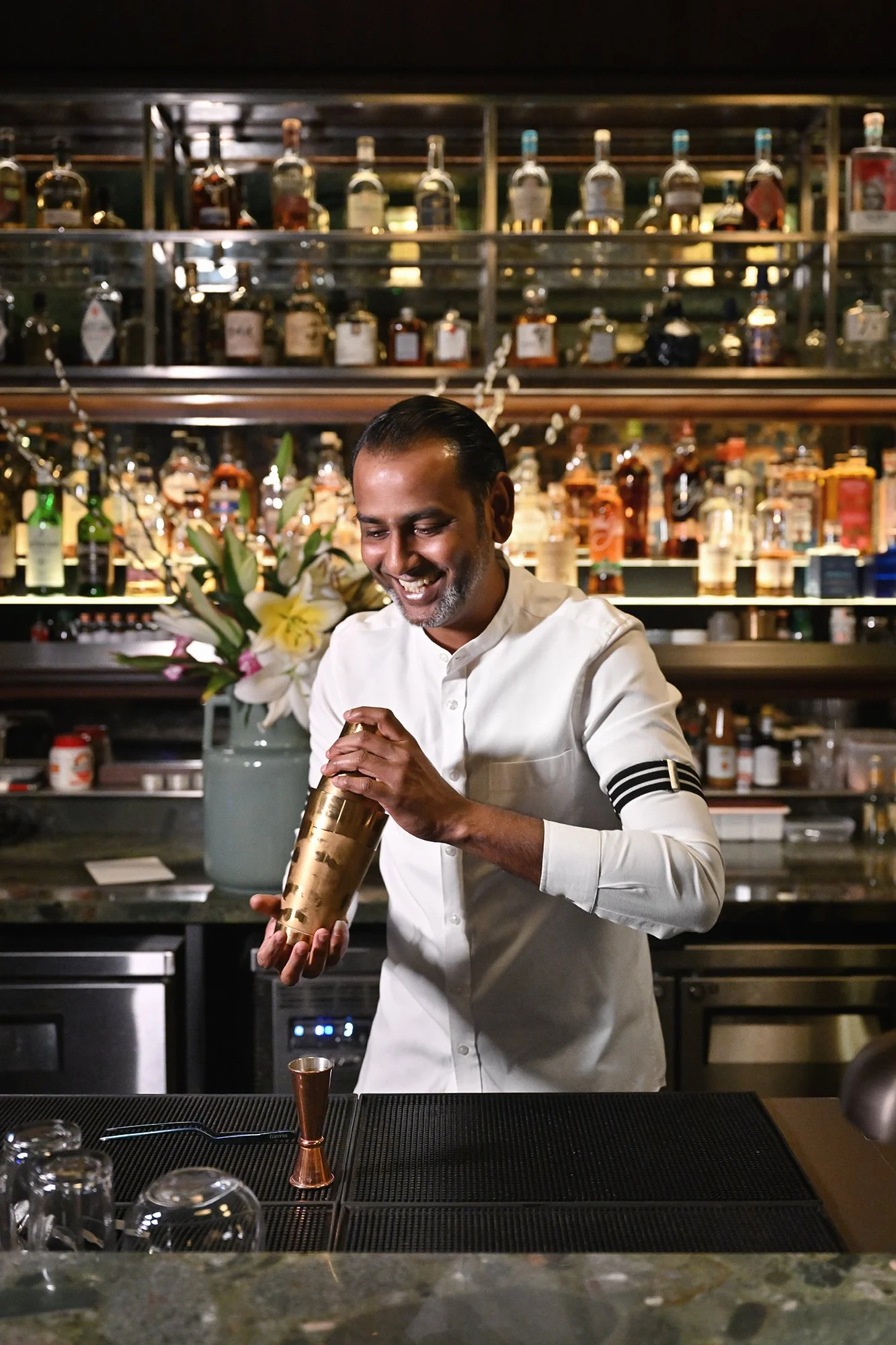 Immersive shot capturing the artistry of the bartending team at Yantra.