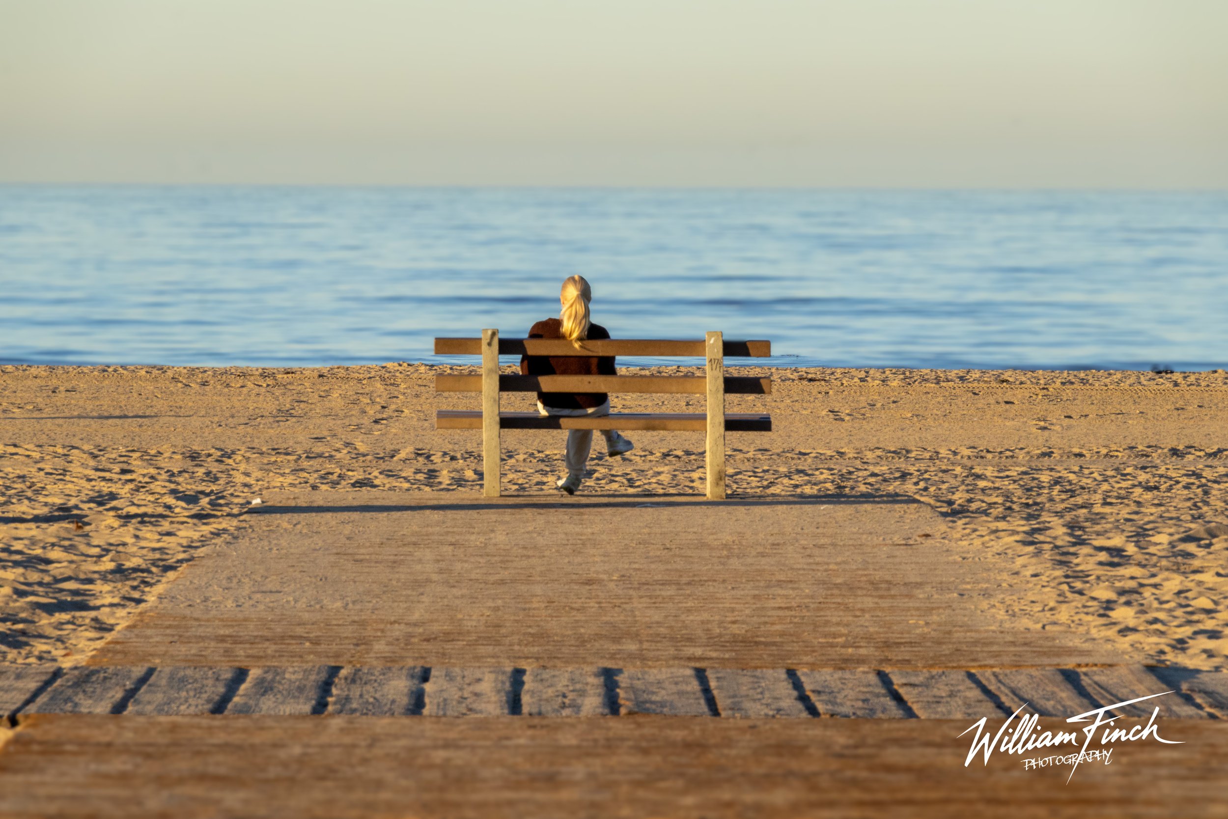 Girl_Sitting_Beach.jpg