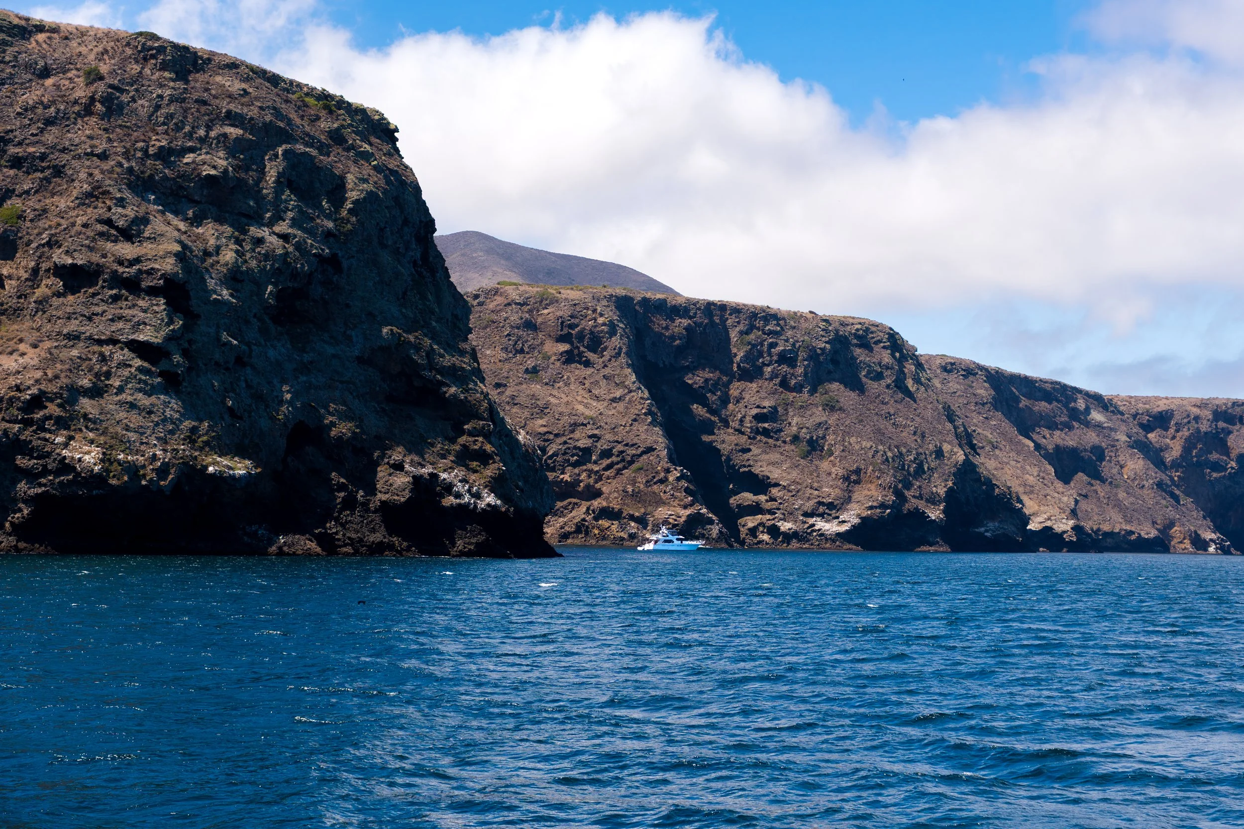Boat Moored By Cliffs.jpg