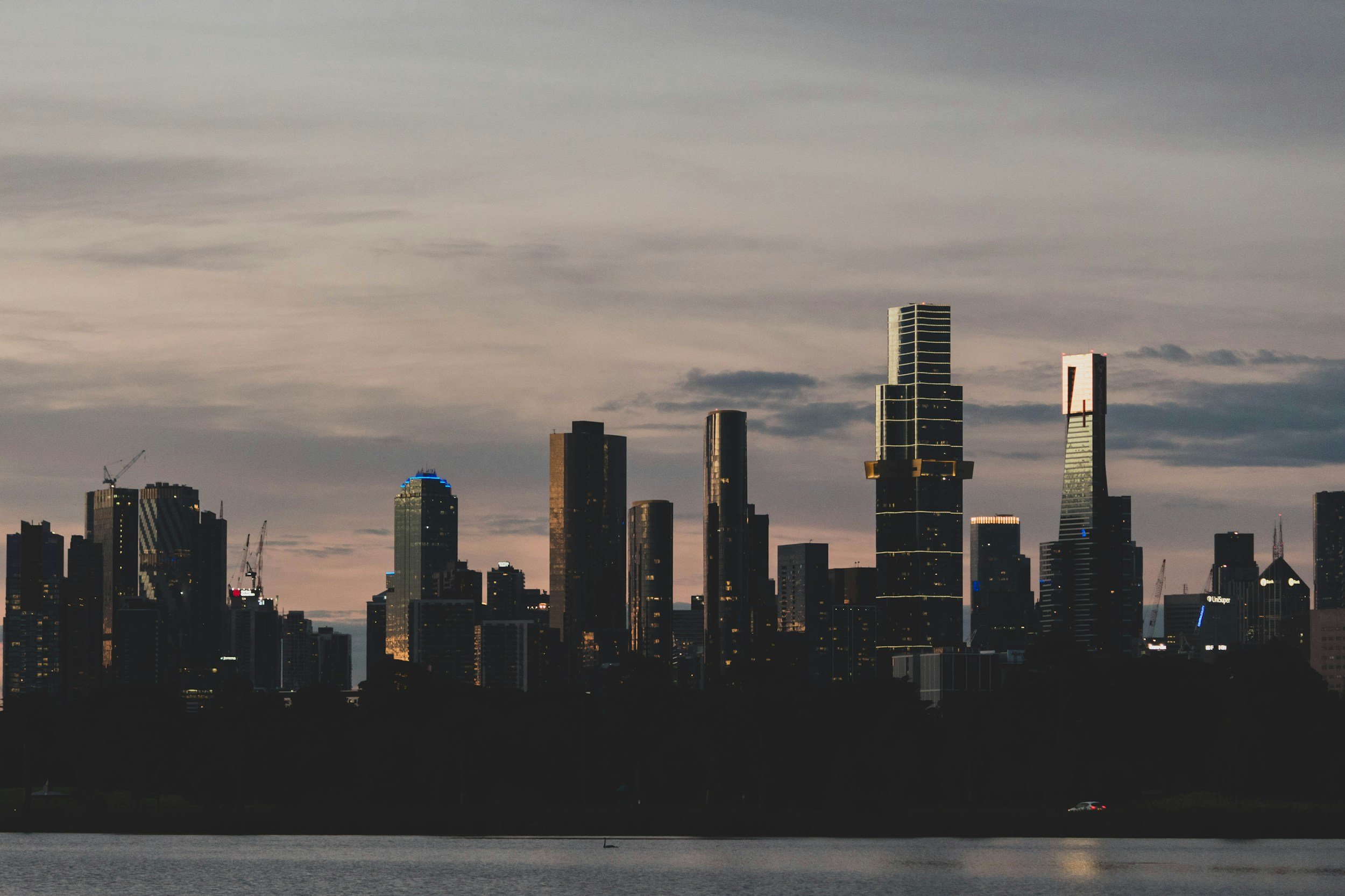 Melbourne city skyline at dusk, symbolising urban development and planning support.