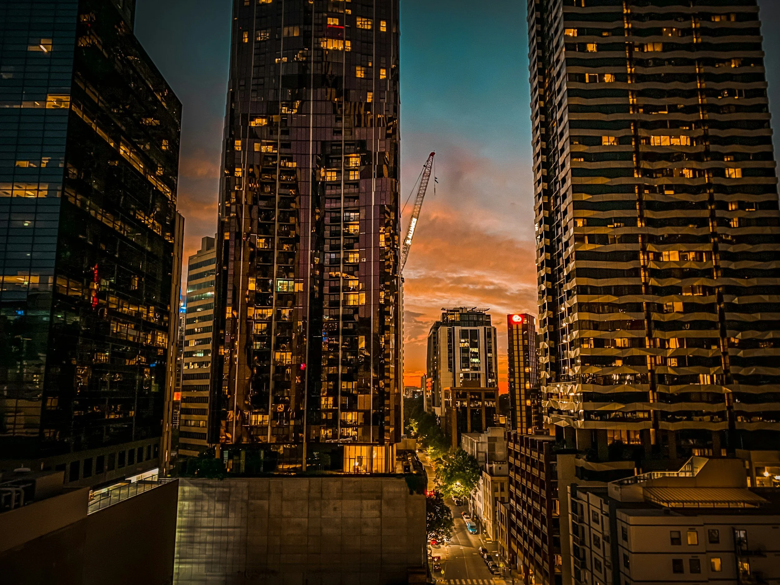 High-rise Melbourne apartments at sunset, relating to Better Apartments Design Standards (BADS).