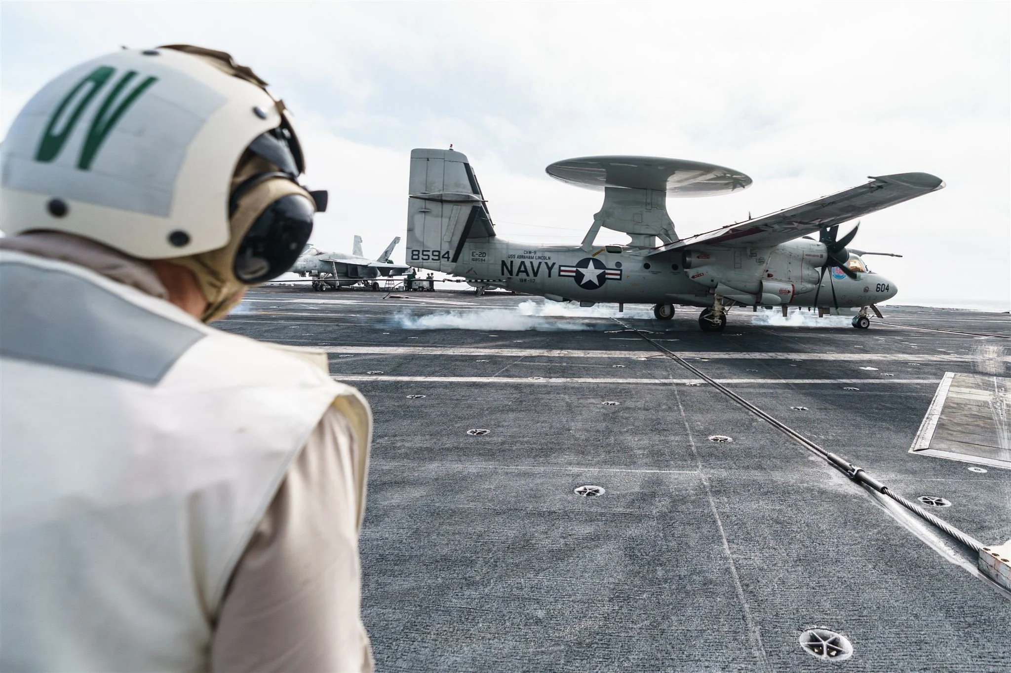  NASCAR on Prime’s Adam Alexander, Steve Letarte, and NFL on Prime’s Ryan Fitzpatrick aboard the U.S.S. Abraham Lincoln for Amazon 