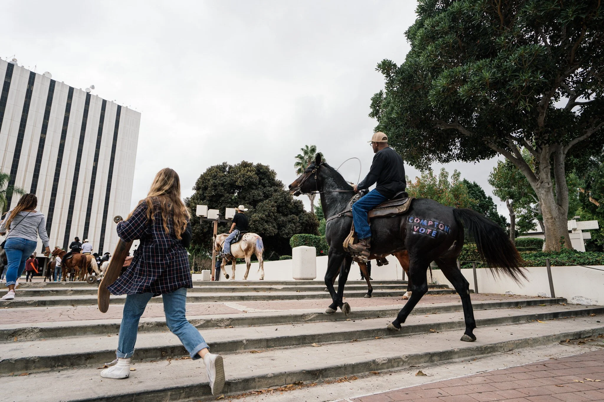  The Compton Cowboys ride to the City of Compton Public Library ballot box on October 25, 2020 to cast their ballots. 