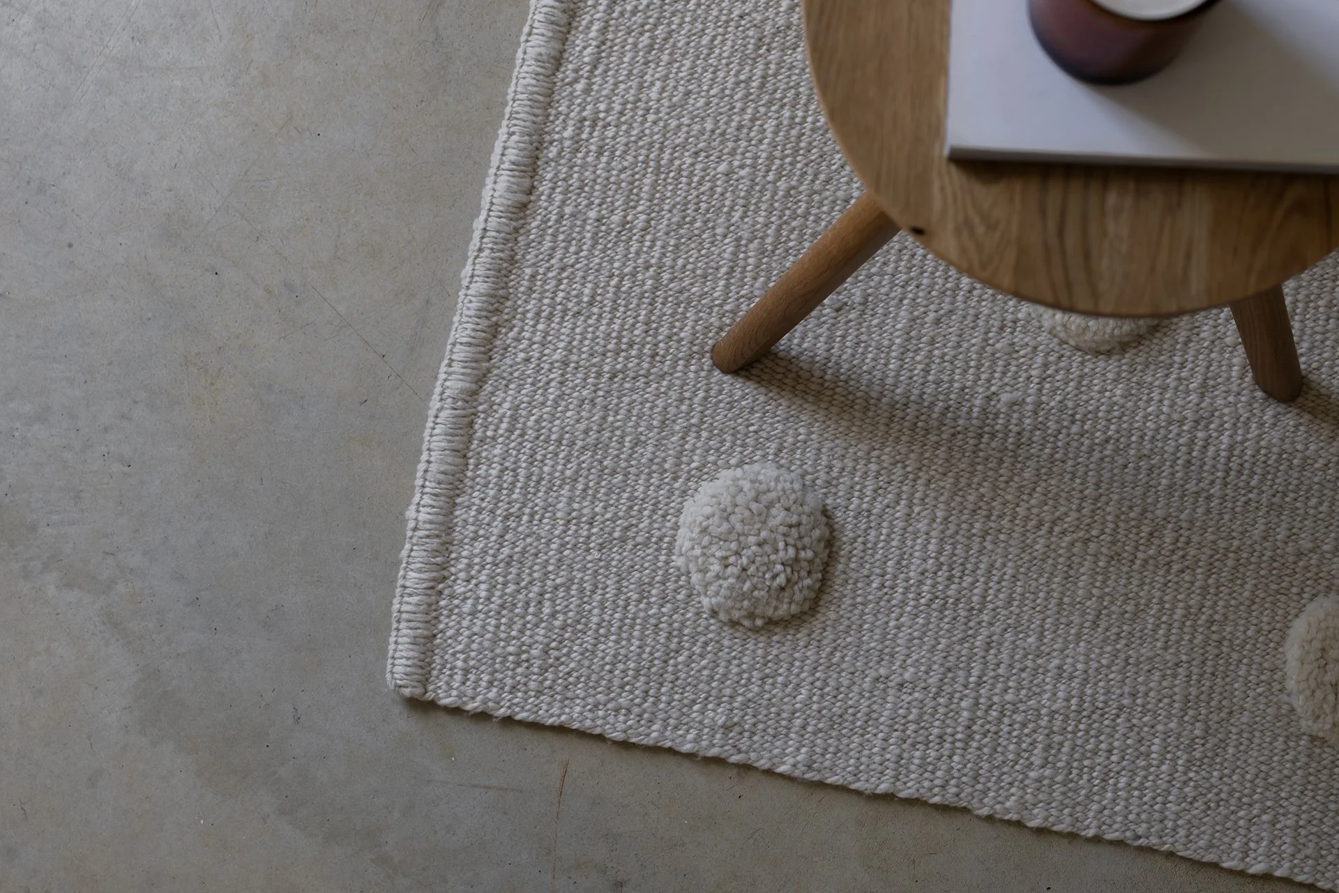 HANDMADE RUG AND LEATHER CHAIR
