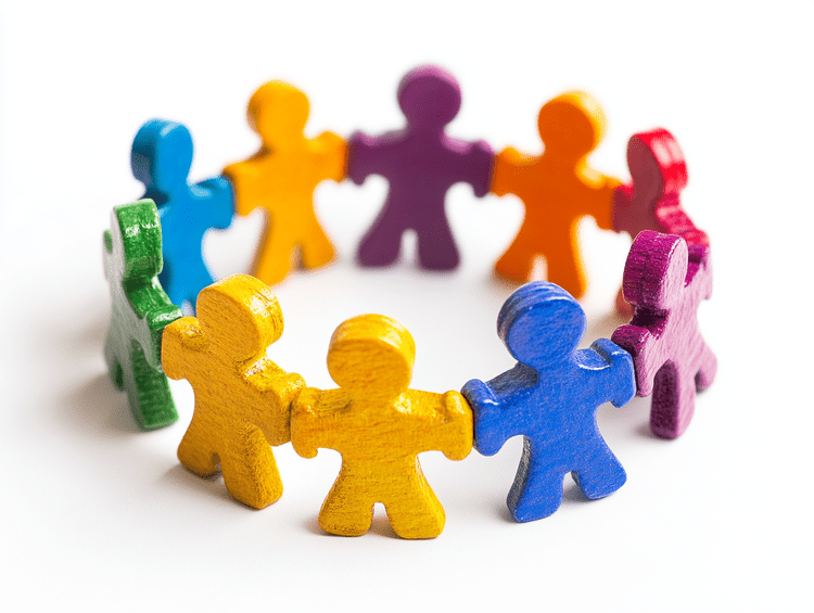 Colorful toy figurines forming a circle on a white background.
