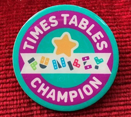Badge cropped.jpg