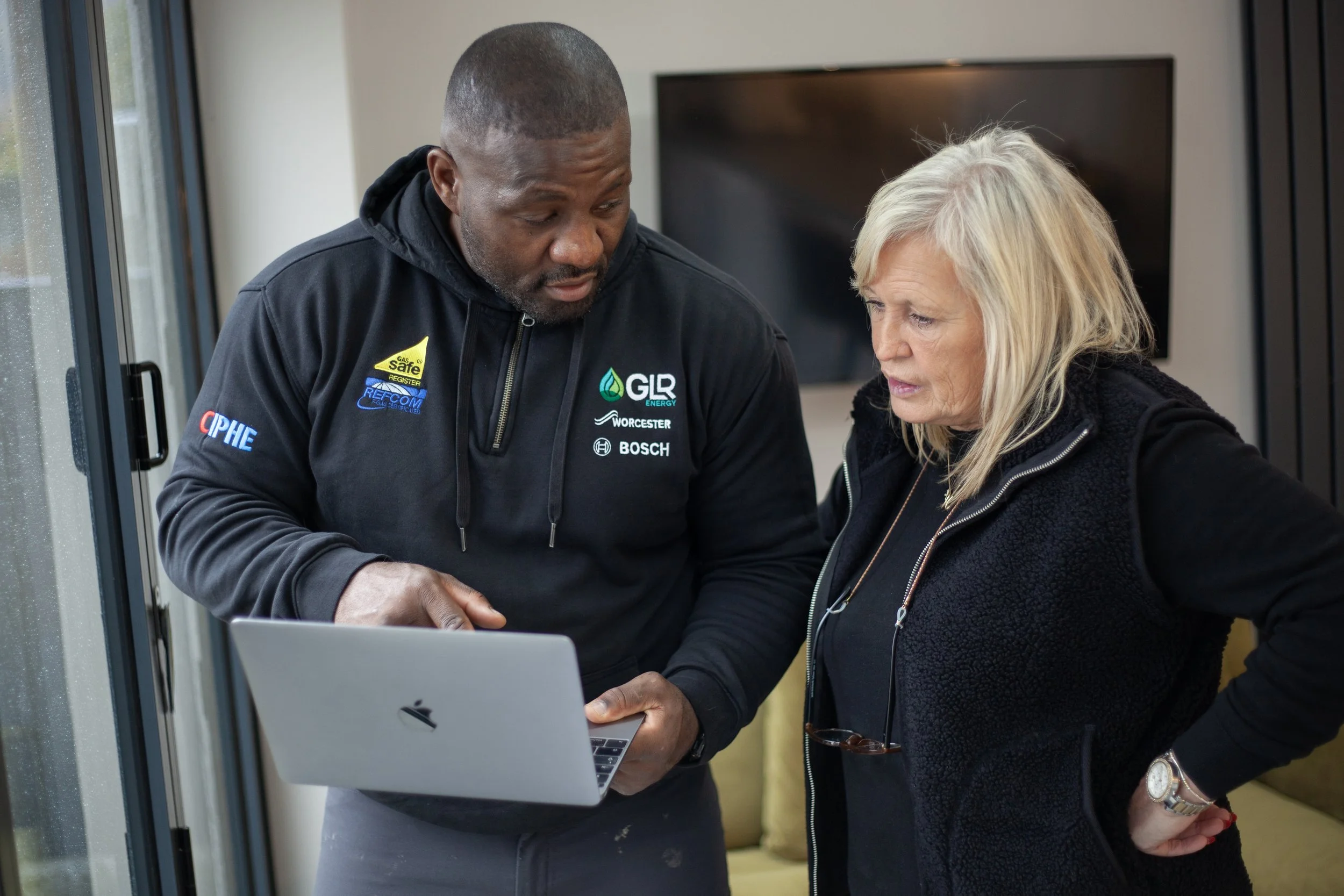 Checkatrade work. Phil discussing potential future projects with a customer. Chester.