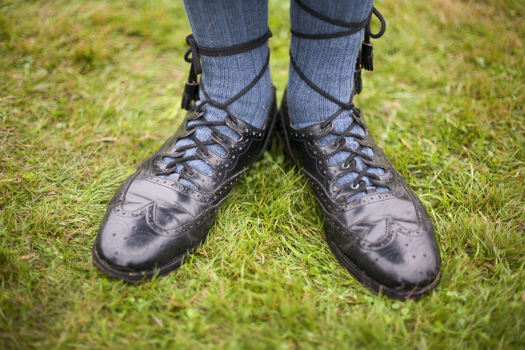 The shoes of a bagpiper at the Highland Games. near Glasgow. Scotland. 2017.
