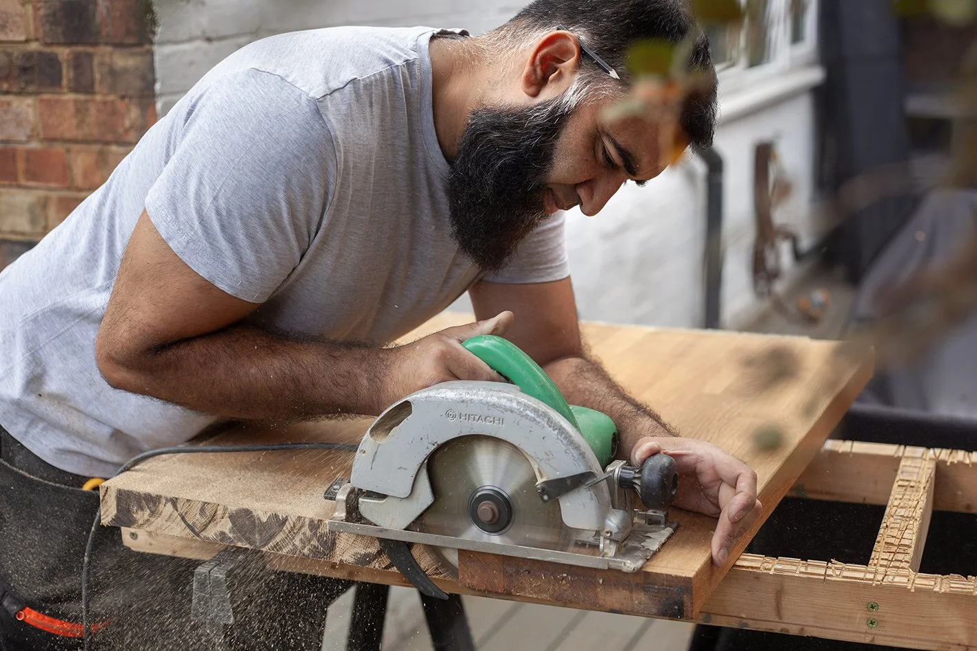 Sajid Khan, a handyman. Working at a domestic property in St Albans.
UK, 2025