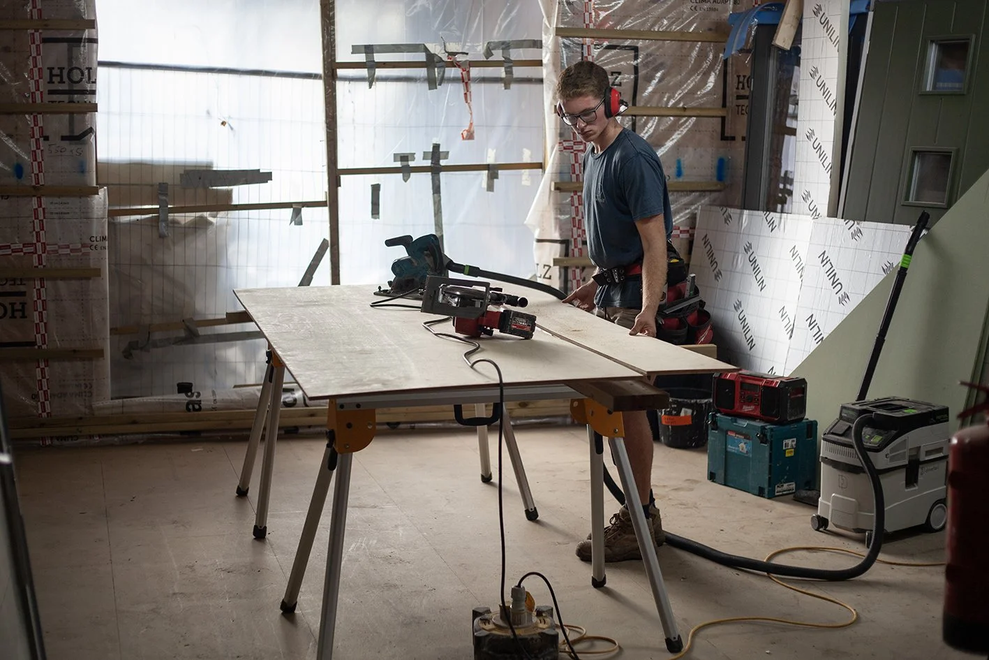 Dovetail ltd, a construction company in Bristol, UK.
The team at work on a timber frame house in St Werburghs.