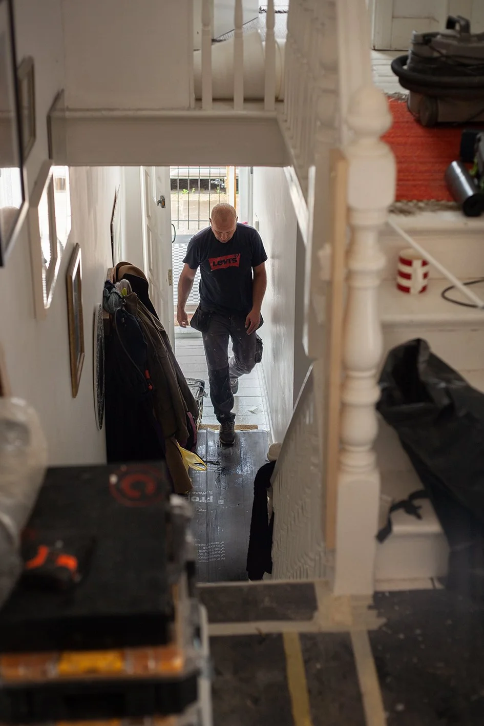 Checkatrade work. Harringay, London. Tomazs, at work as a bathroom renovator. 2025.