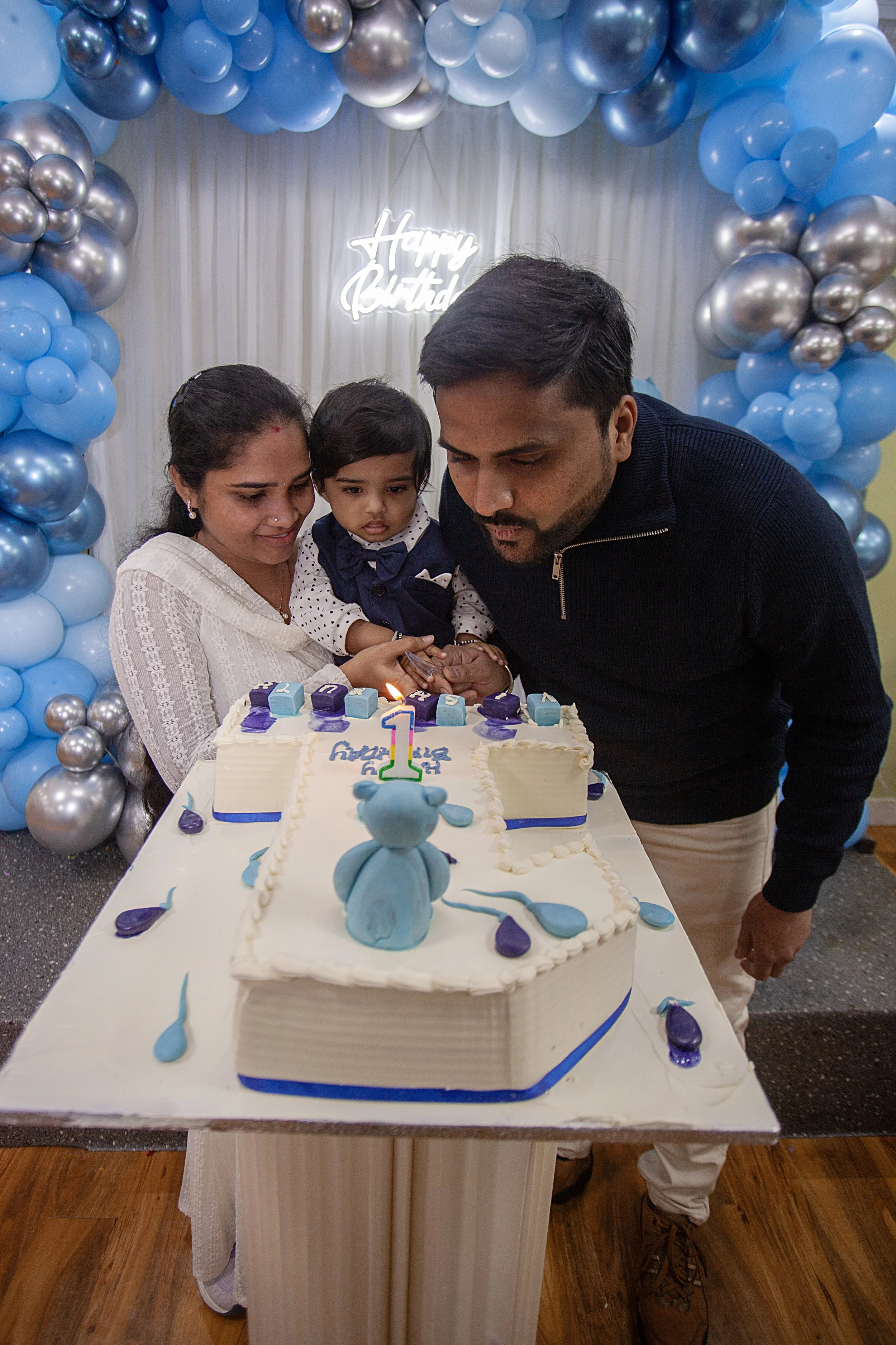 Kasinath's birthday party. East Ham, London. 2025. Blowing out the candles.