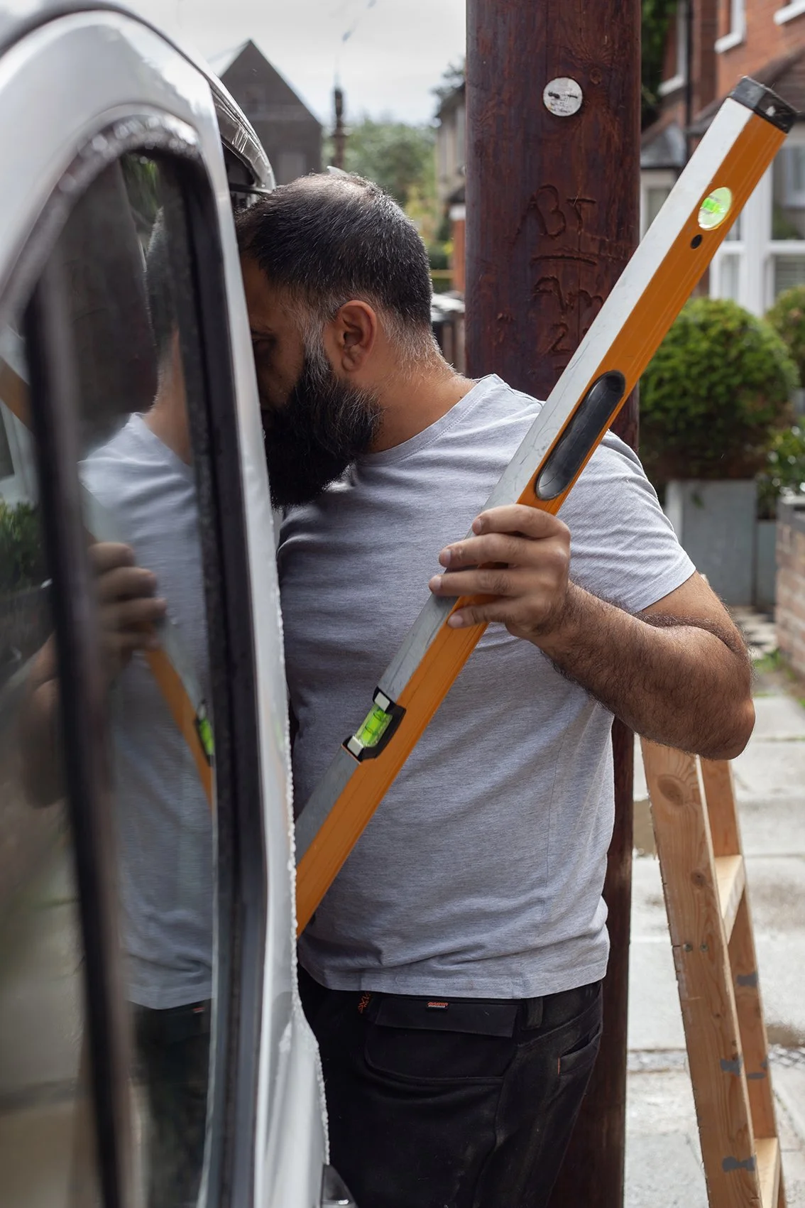 Sajid Khan, a handyman. Working at a domestic property in St Albans.
UK, 2025
