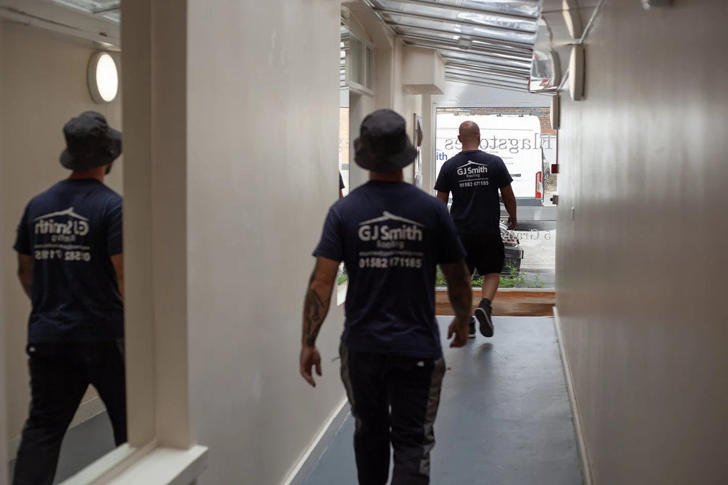Checkatrade work. The team from G J Smith roofing at work in Aylesbury. Stopping for lunch. 2025.